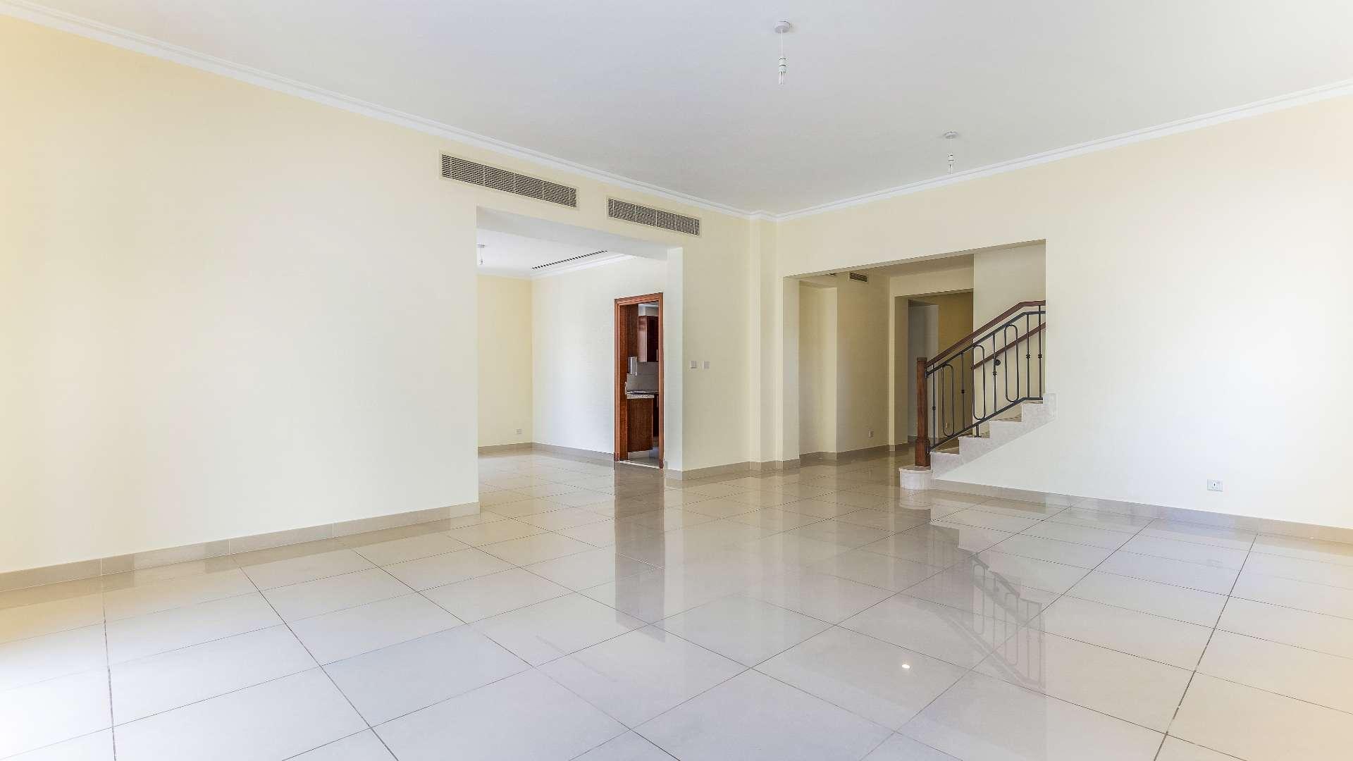 "Spacious balcony view of Samara community villas in Arabian Ranches 2, for rent.",Spacious living room in five-bedroom villa, Arabian Ranches 2, Samara, for rent