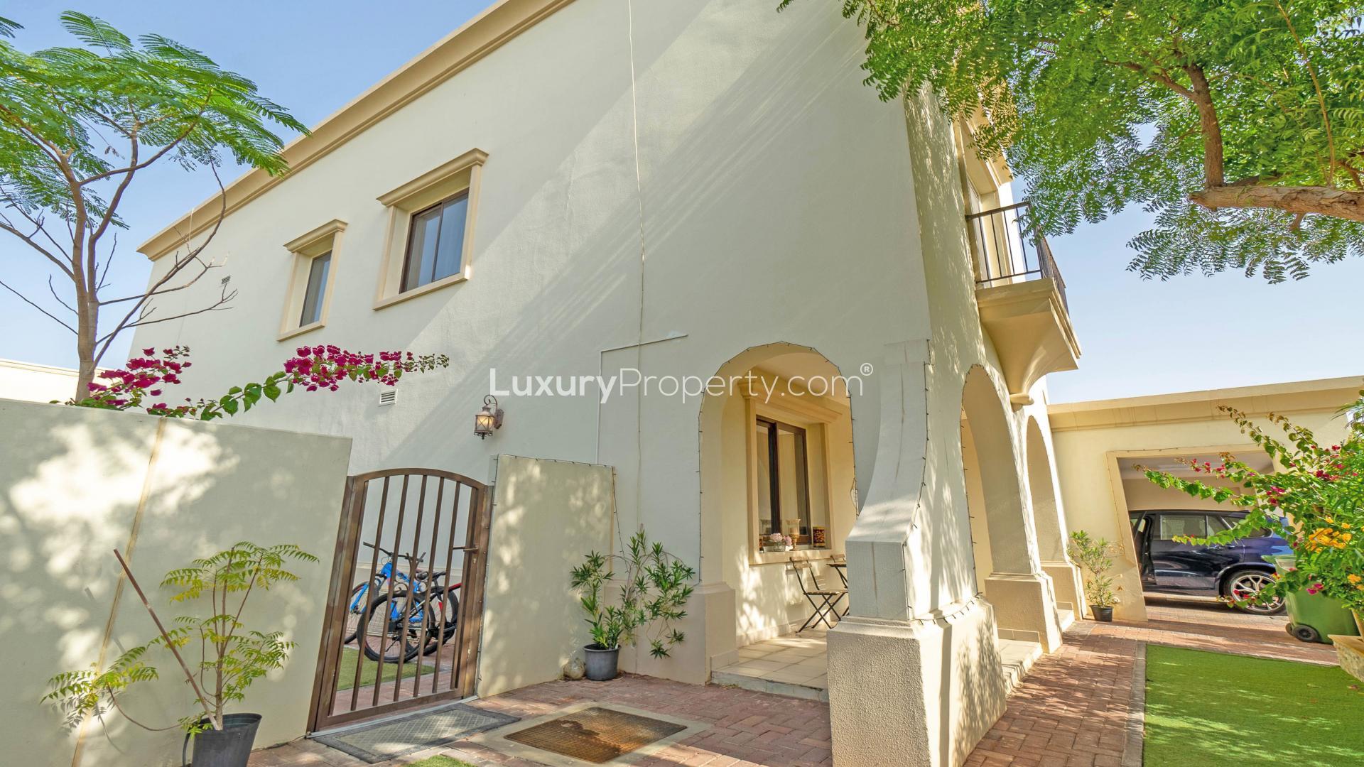 Beautiful villa exterior with lush greenery in Samara, Arabian Ranches 2, available for rent