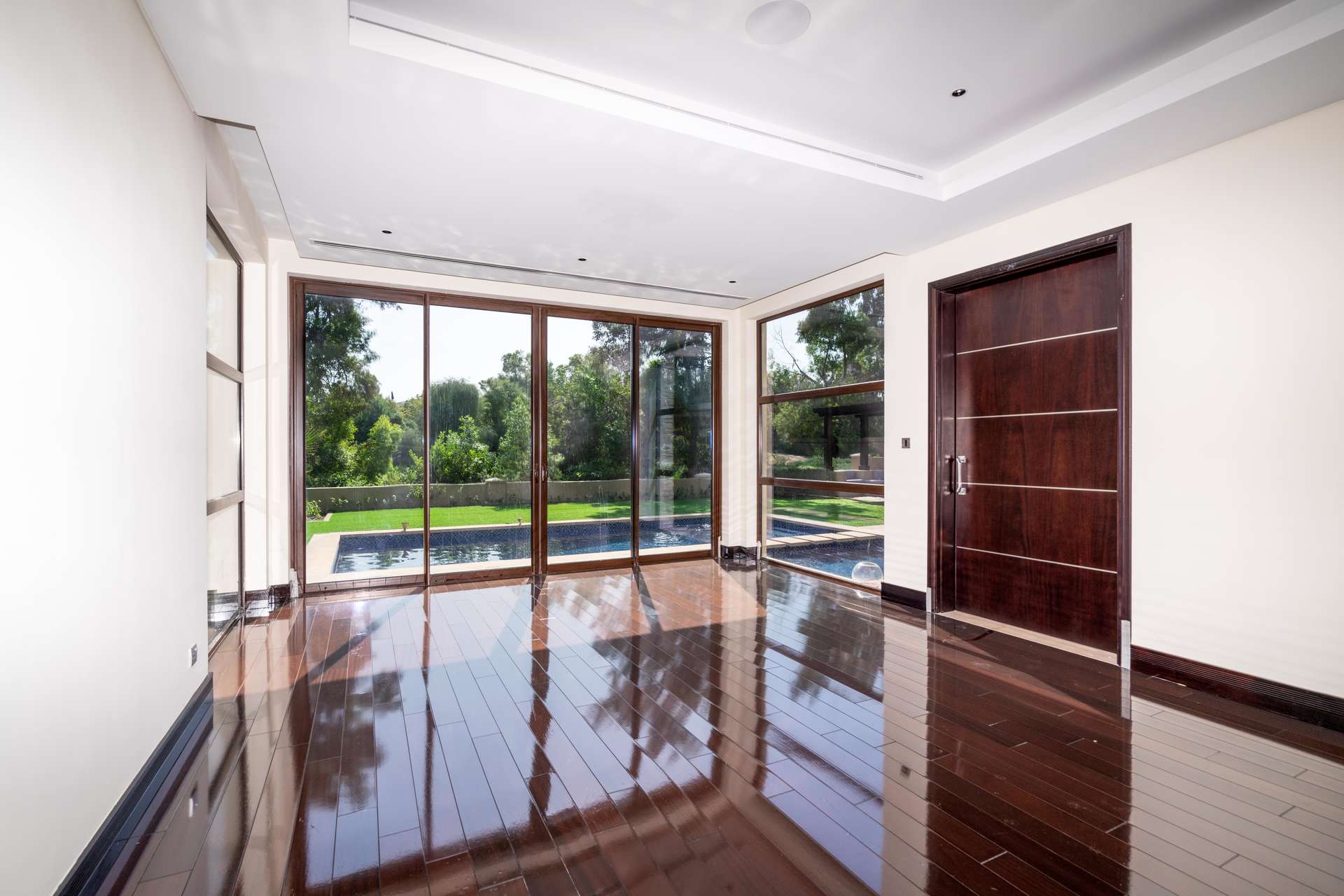 Modern luxury villa exterior in Sanctuary Falls, Jumeirah Golf Estates, available for rent