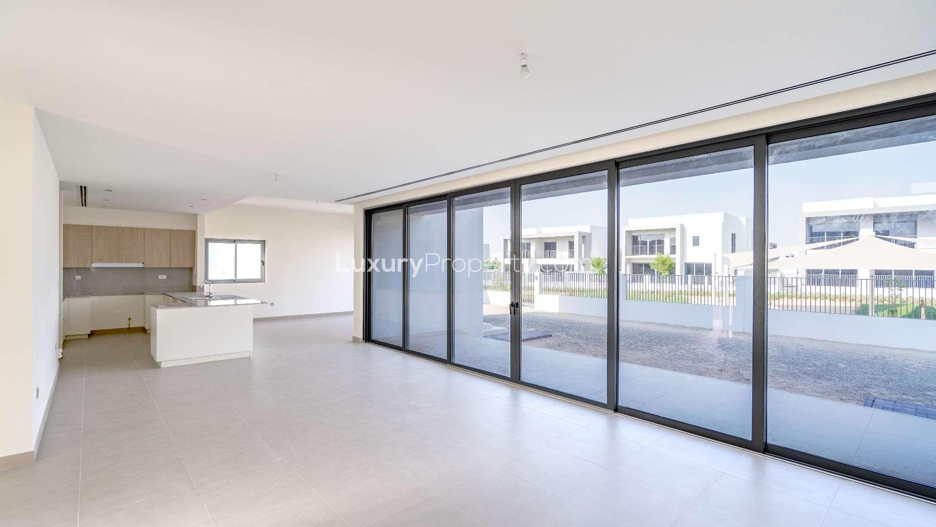 Modern villa exterior in Sidra Villas, Dubai Hills Estate, featuring sleek design and spacious layout