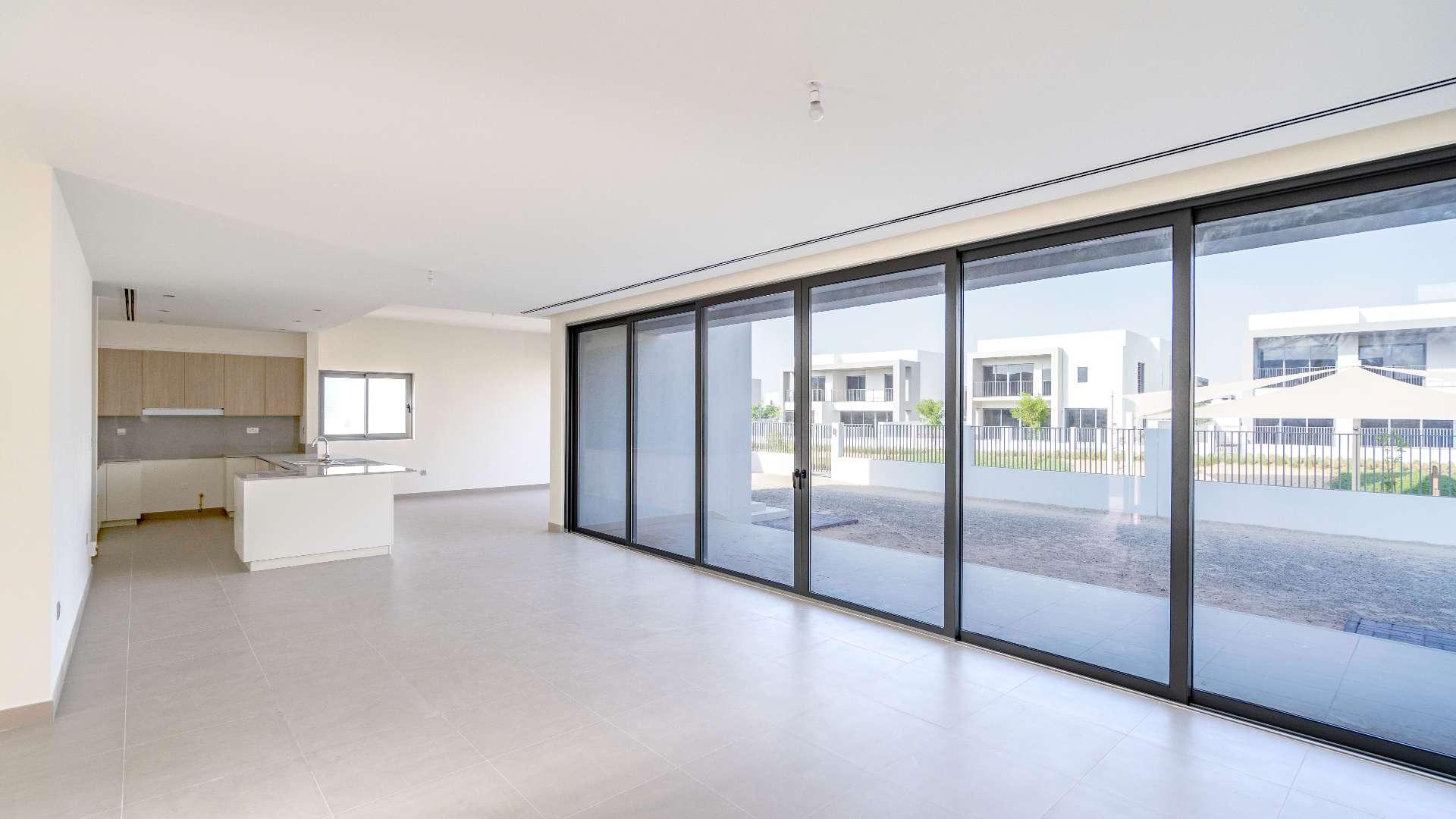 Modern villa exterior in Sidra Villas, Dubai Hills Estate, featuring sleek design and spacious layout