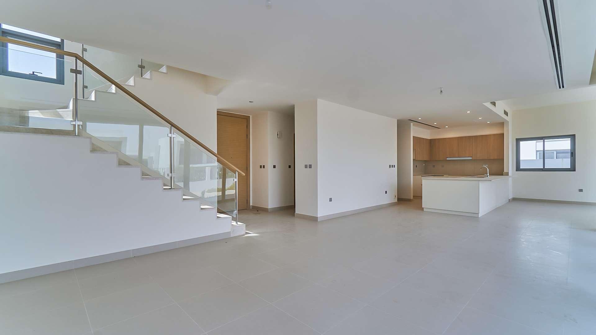 Spacious living area with large windows in Sidra Villas, Dubai Hills Estate villa for rent