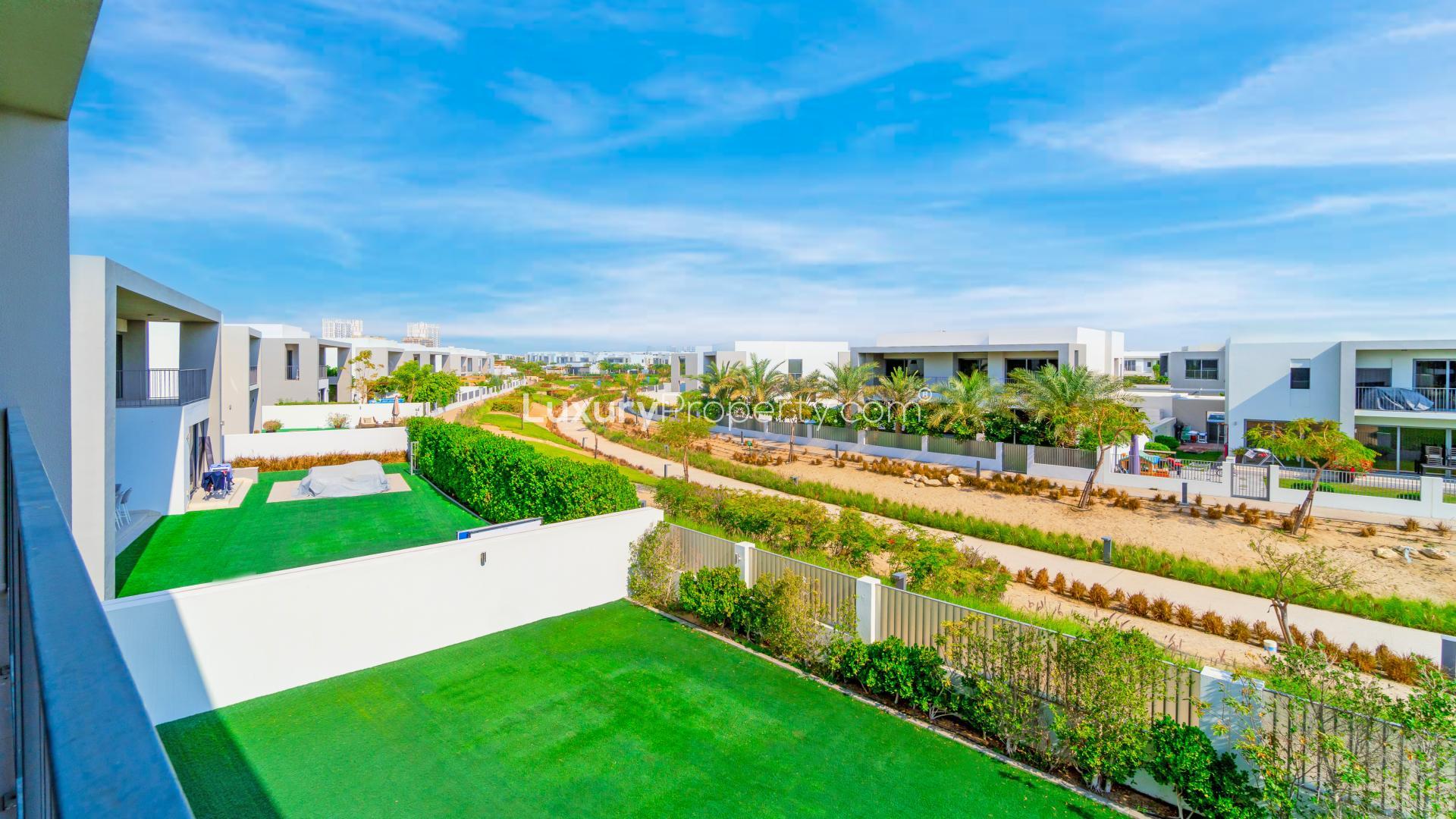 Empty bedroom with wooden doors and built-in wardrobe in Sidra Villas, Dubai Hills Estate