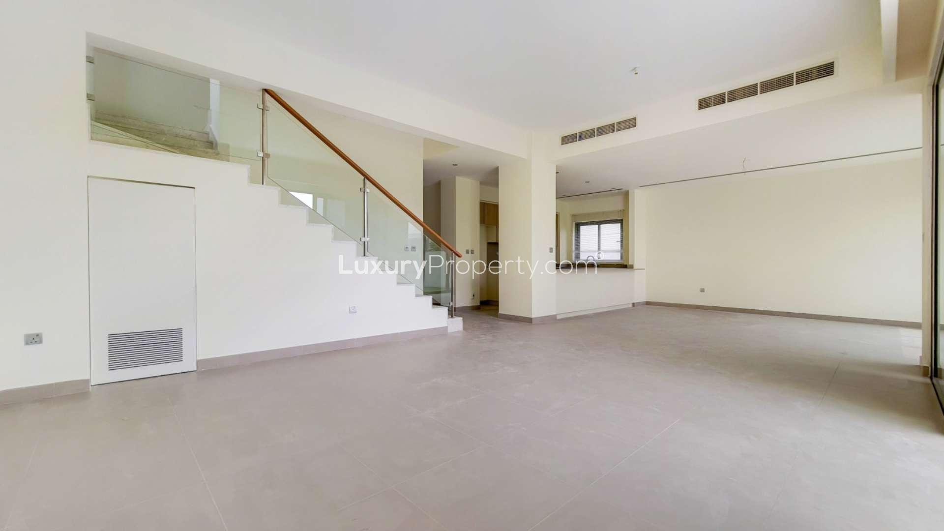 Spacious living room with garden views in Sidra 1 villa, Dubai Hills Estate