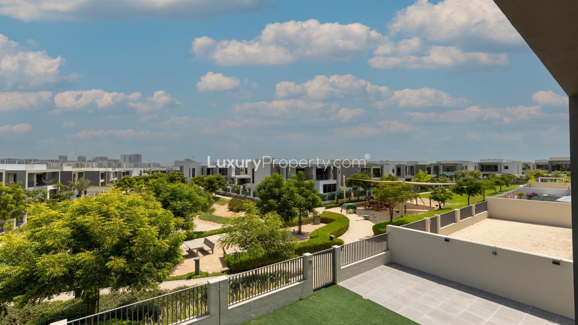 Open-plan kitchen and living area in Sidra Villas, Dubai Hills Estate, with modern finishes