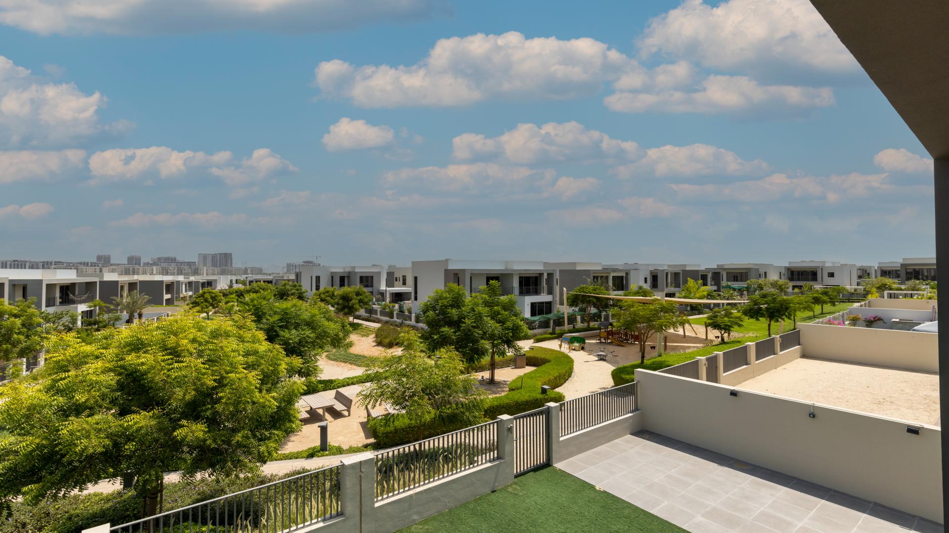 Open-plan kitchen and living area in Sidra Villas, Dubai Hills Estate, with modern finishes