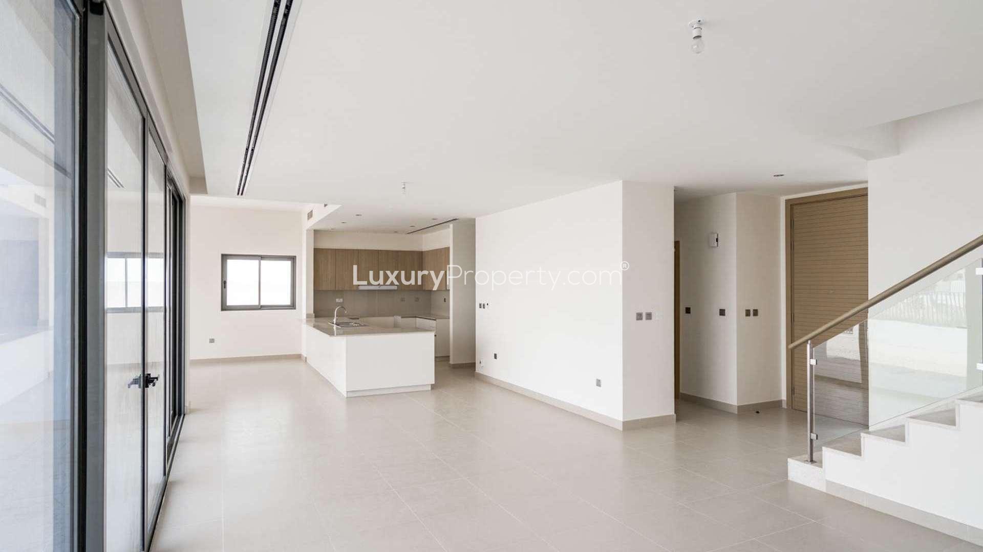 Modern villa exterior with patio and garden in Sidra Villas, Dubai Hills Estate