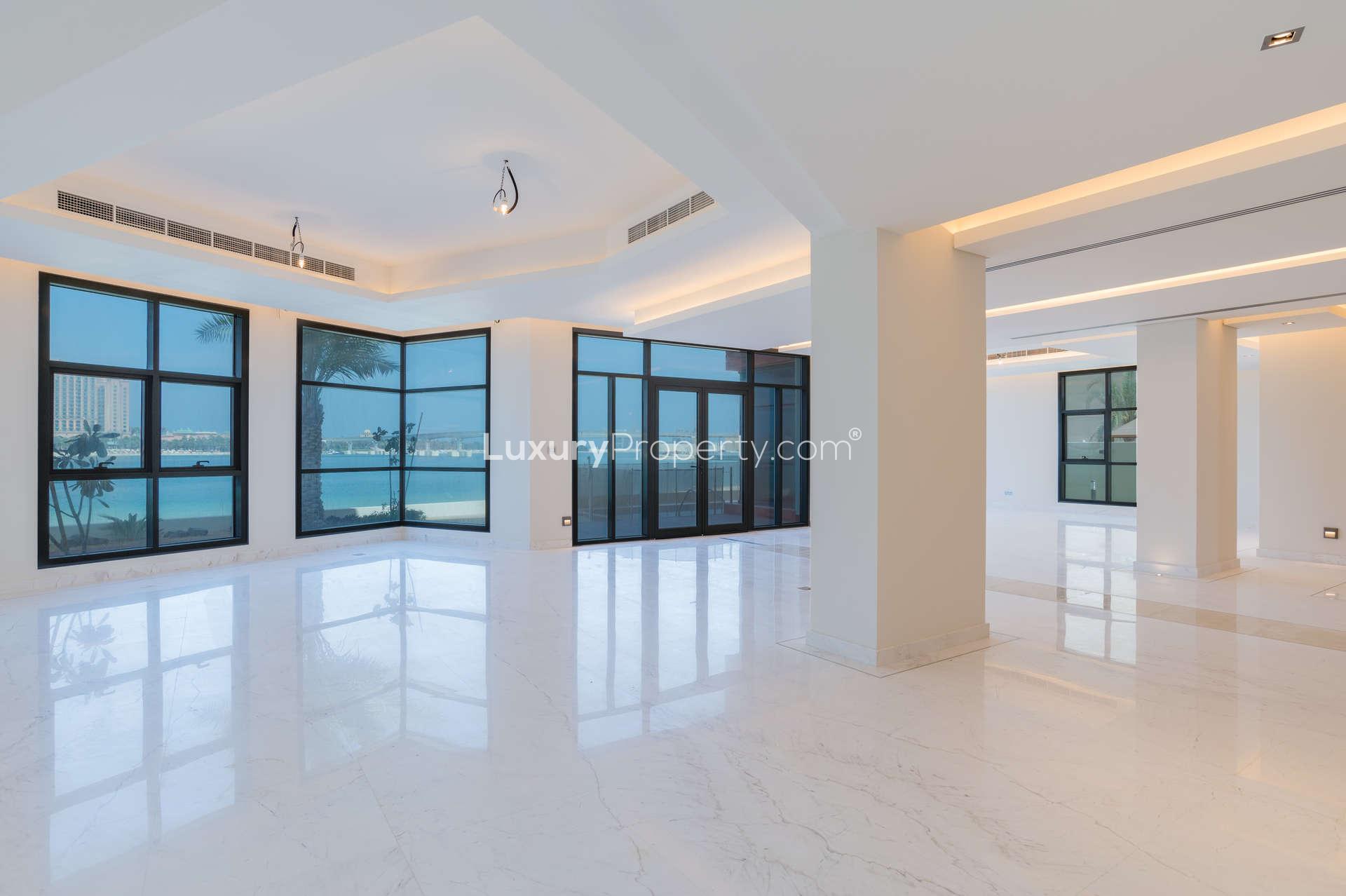 Elegant beachfront villa interior with marble floors on Palm Jumeirah, Signature Villas community
