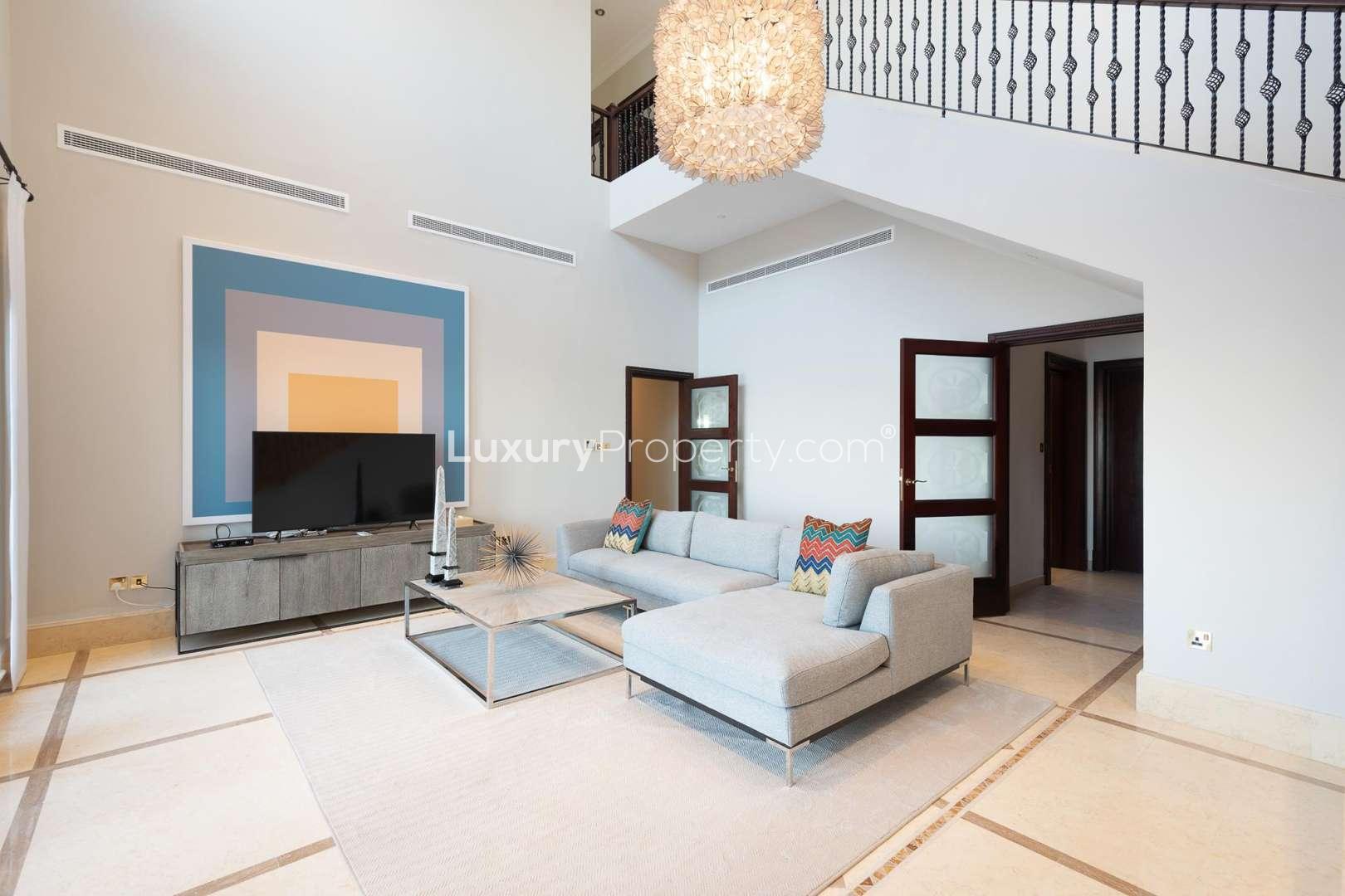 Interior view of Signature Villa staircase with arched windows, Palm Jumeirah, Dubai
