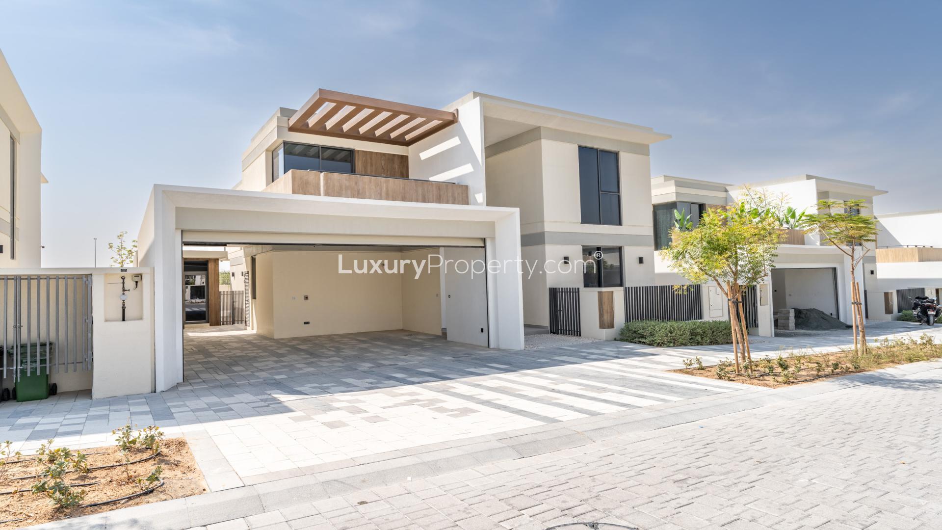 Open-plan living area with marble floors in Harmony villa, Tilal Al Ghaf, Dubai