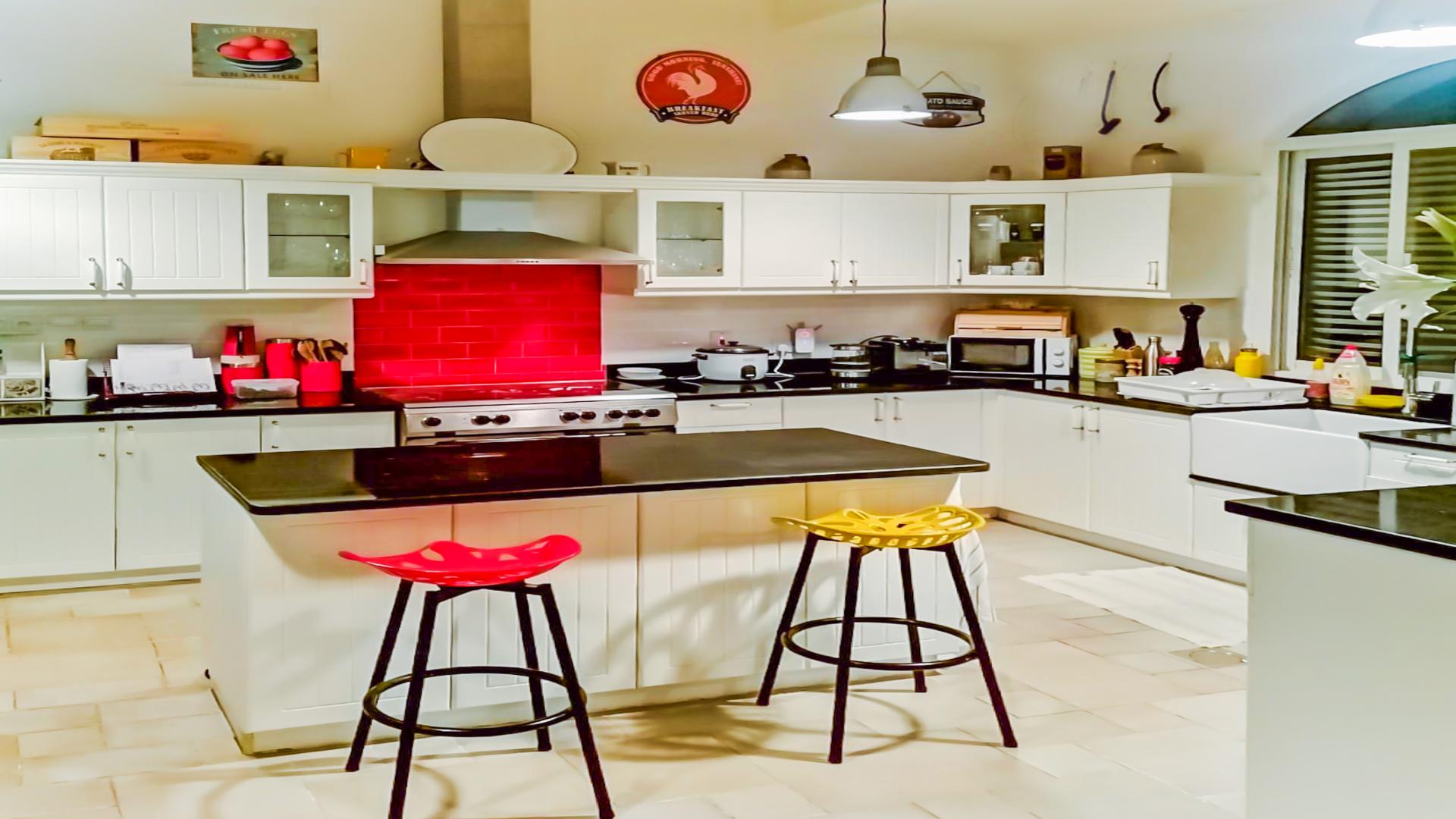 Living room in custom-built 5-bedroom villa, featuring cozy seating and large TV