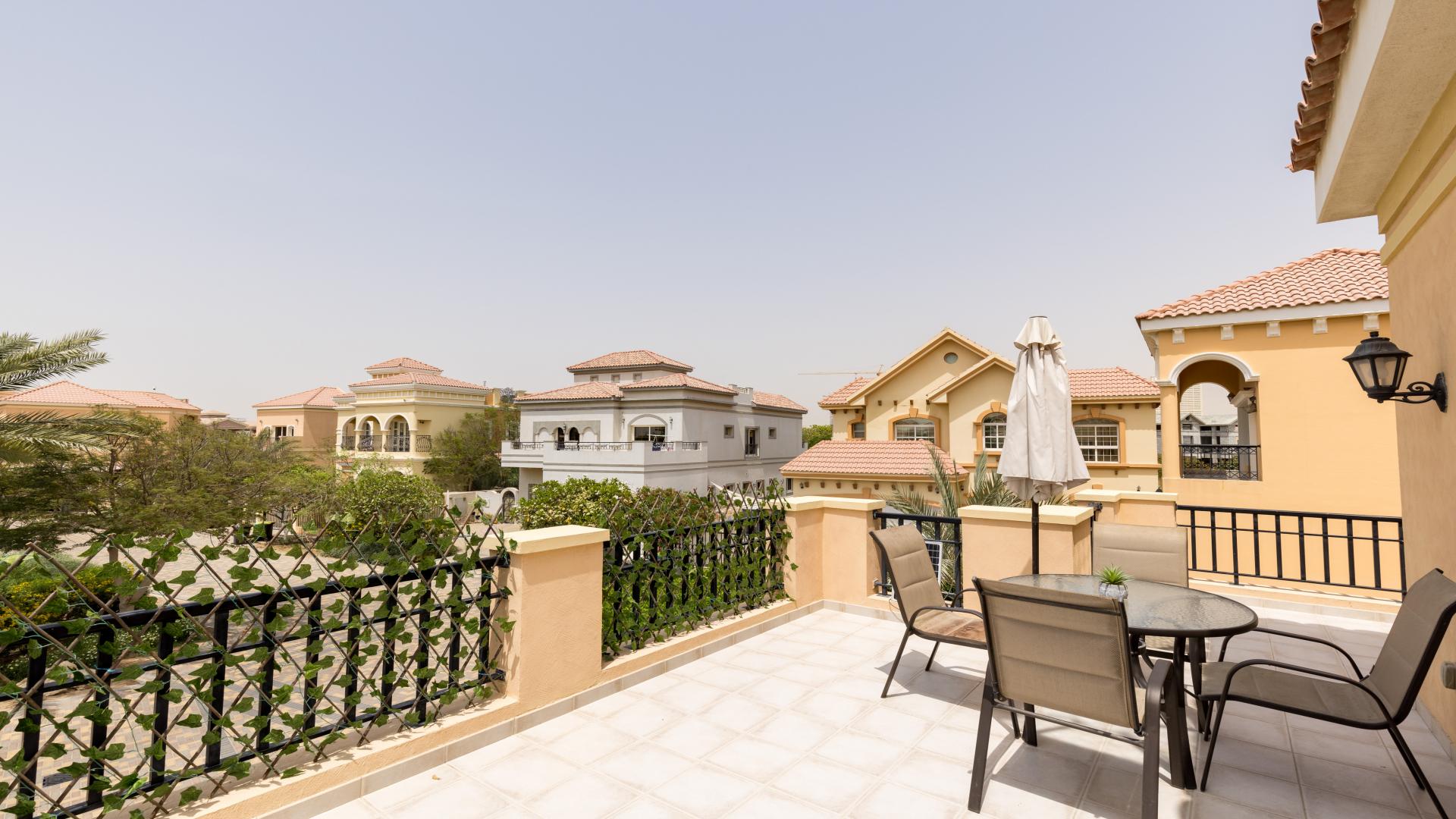 Park-facing villa with private covered pool view from cozy living room in The Centro