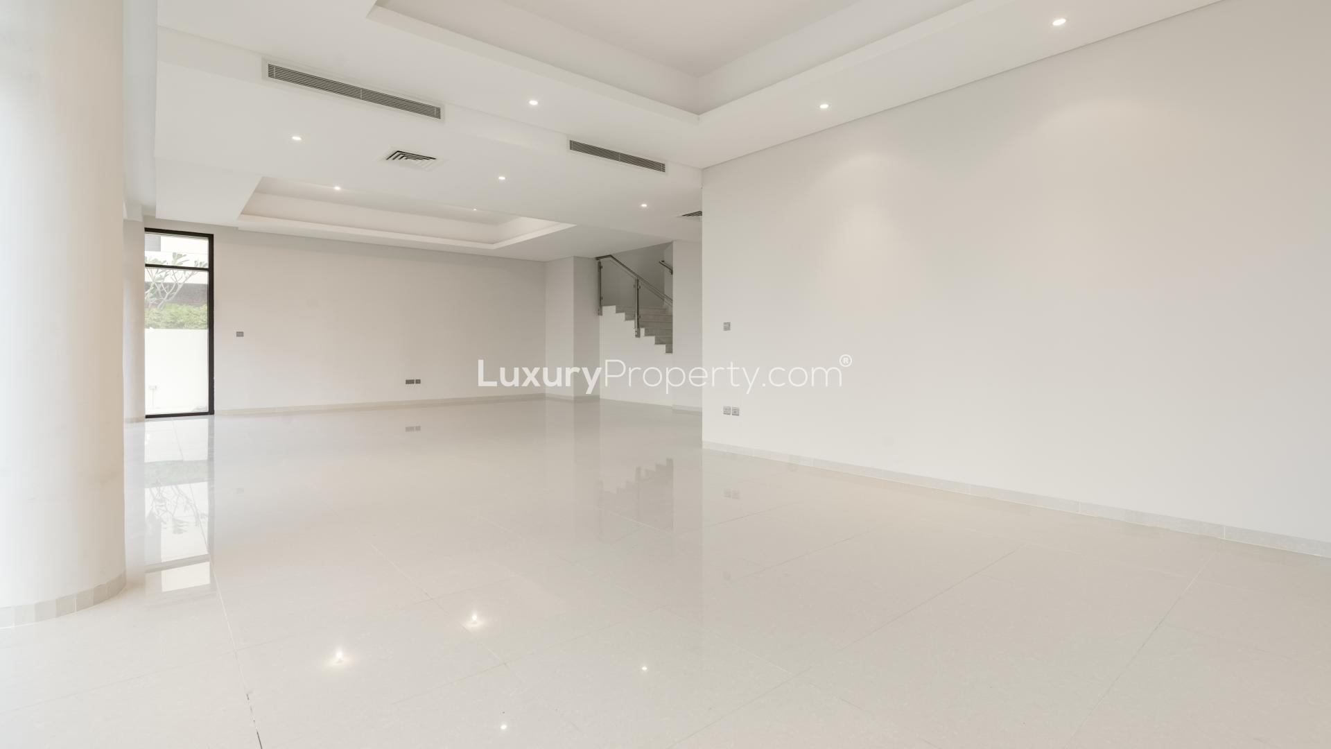 Exterior view of vacant 5-bedroom villa with golf course in Damac Hills, The Turf