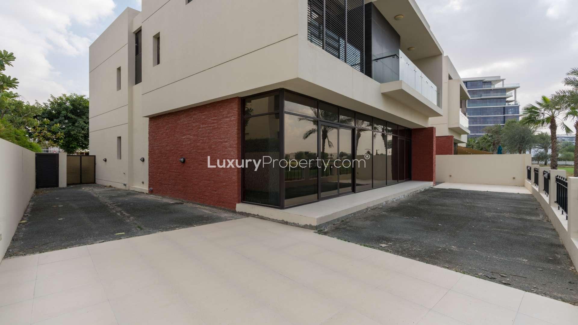 Elegant standalone villa exterior in The Turf, Damac Hills, available for rent