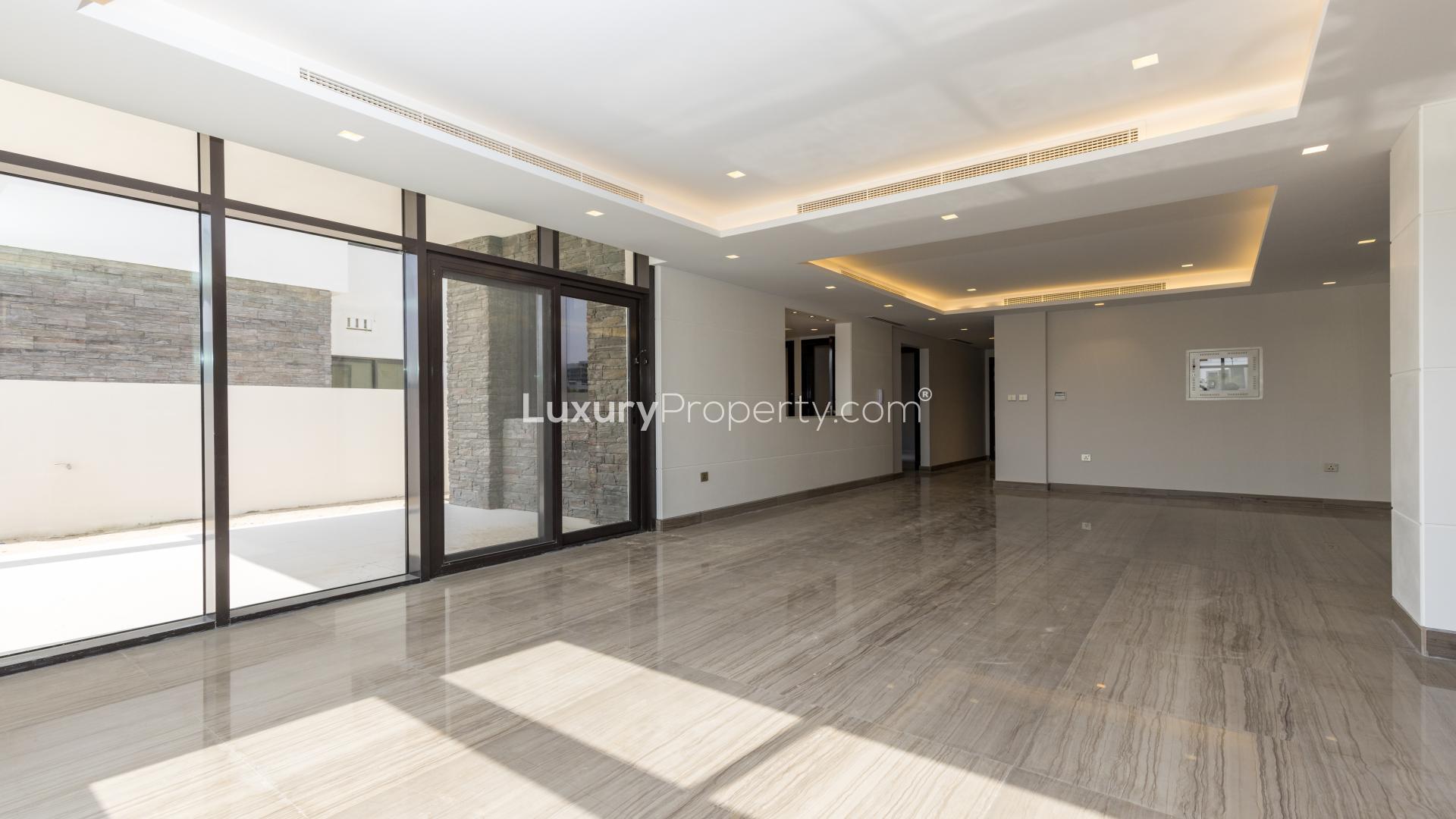 Modern living room in brand new villa, Trump Estates, Damac Hills, available for rent