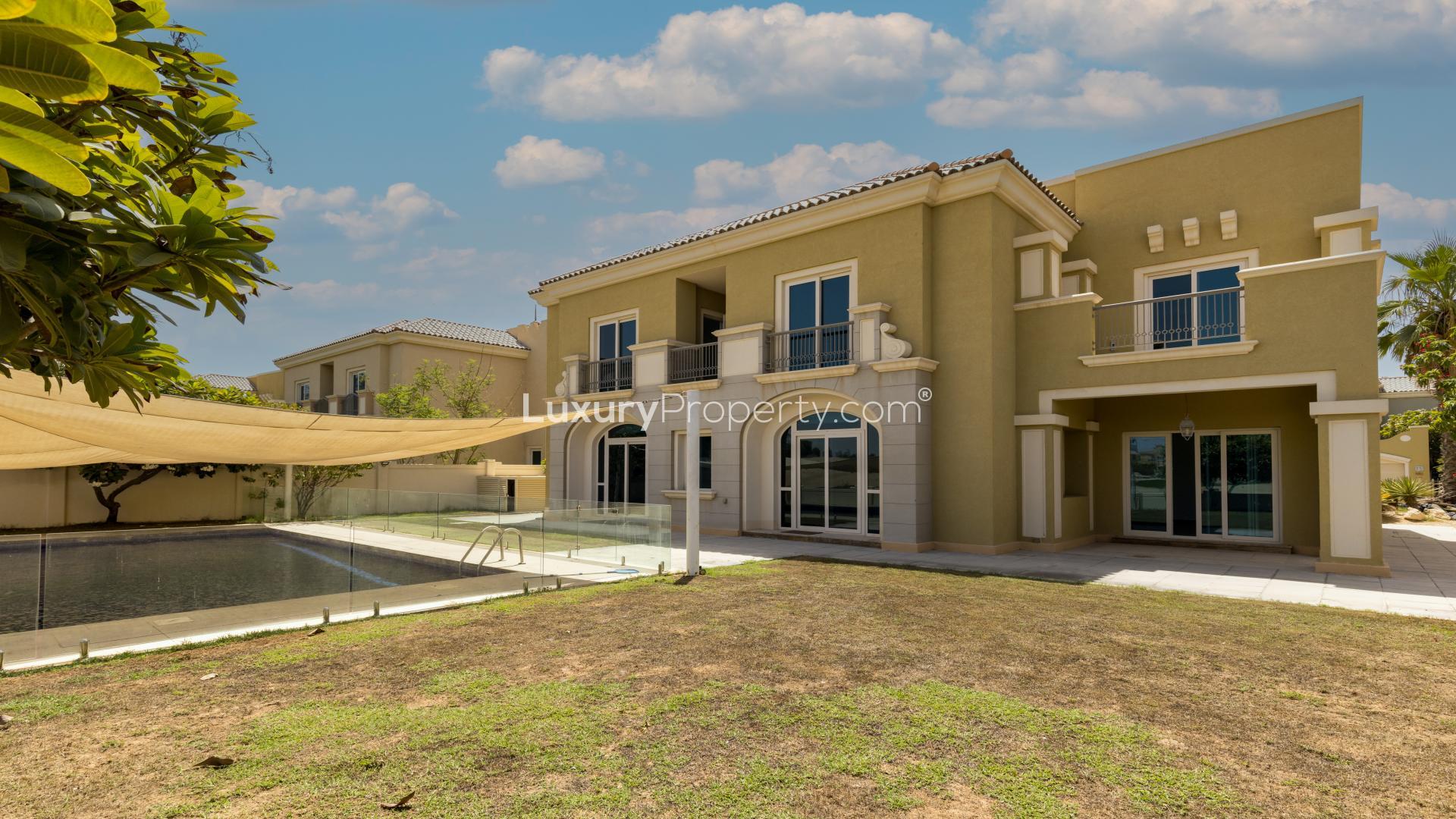 Upgraded villa interior with large glass doors, Victory Heights, Dubai Sports City