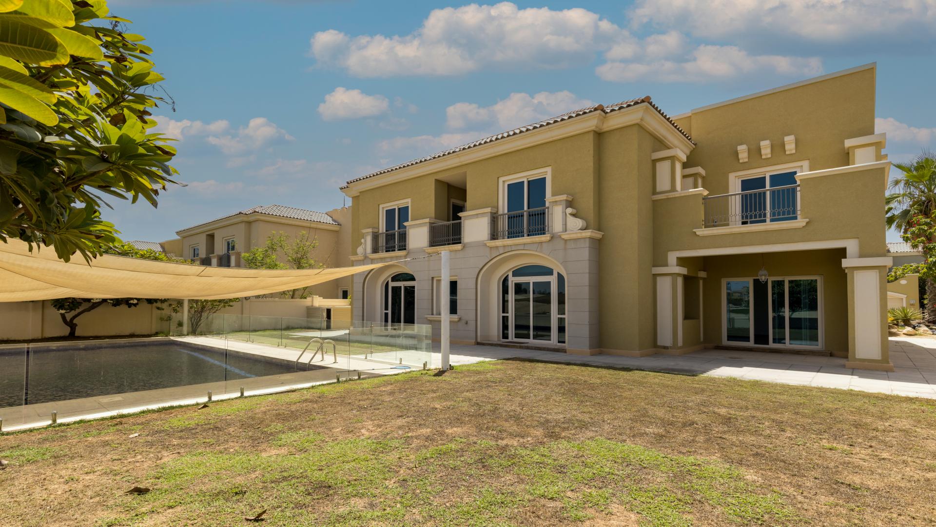 Upgraded villa interior with large glass doors, Victory Heights, Dubai Sports City