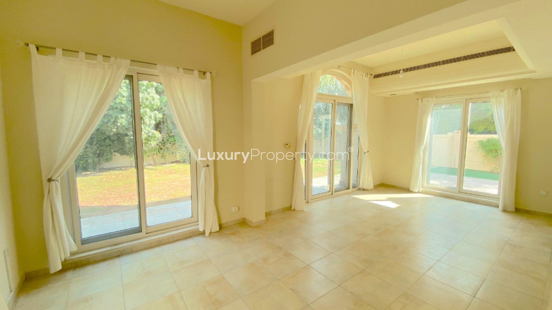 Villa exterior with garden in Victory Heights, Dubai Sports City, for rent mid-October