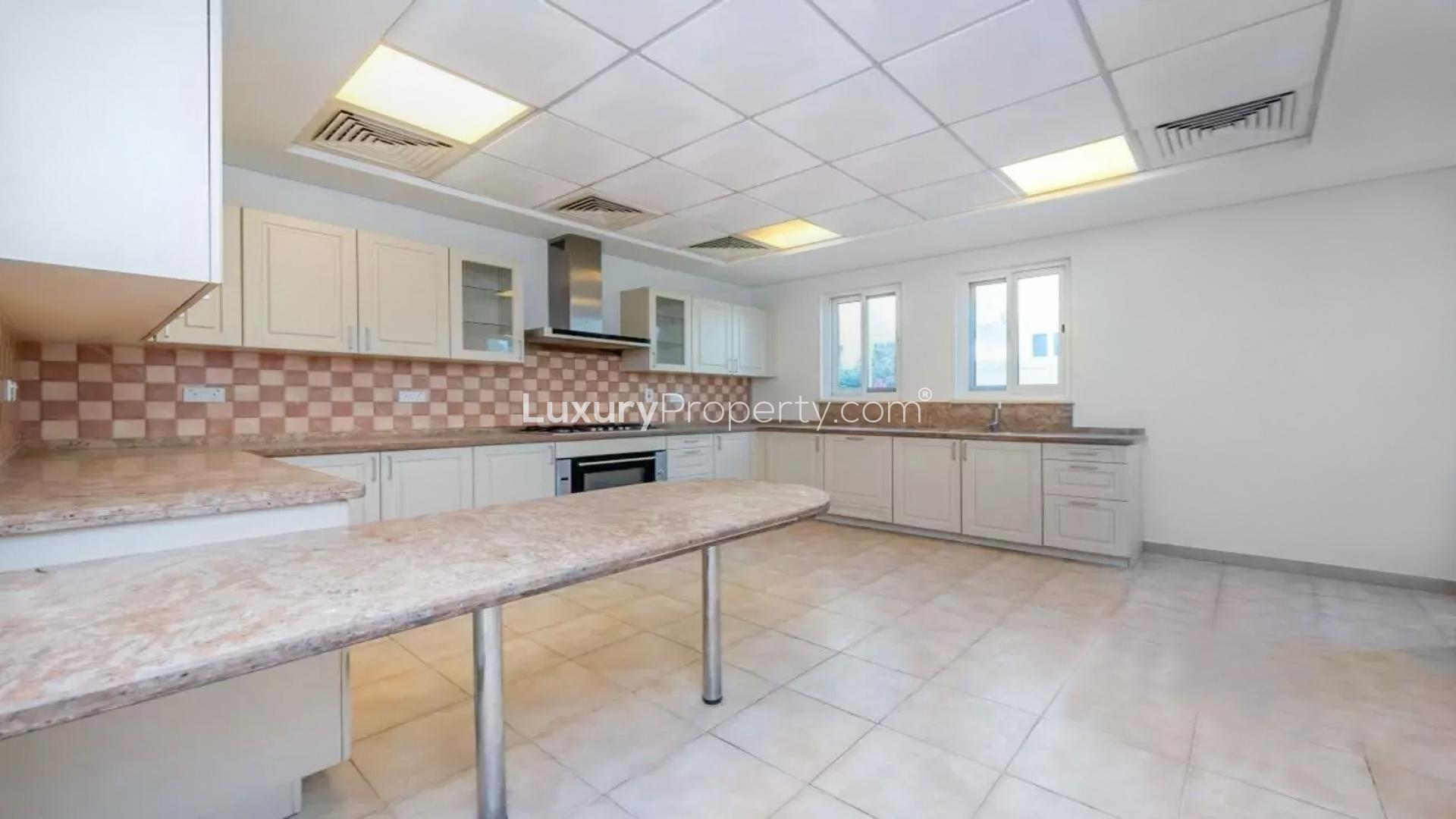 Spacious entryway with elegant staircase in five-bedroom villa, Victory Heights, Dubai Sports City