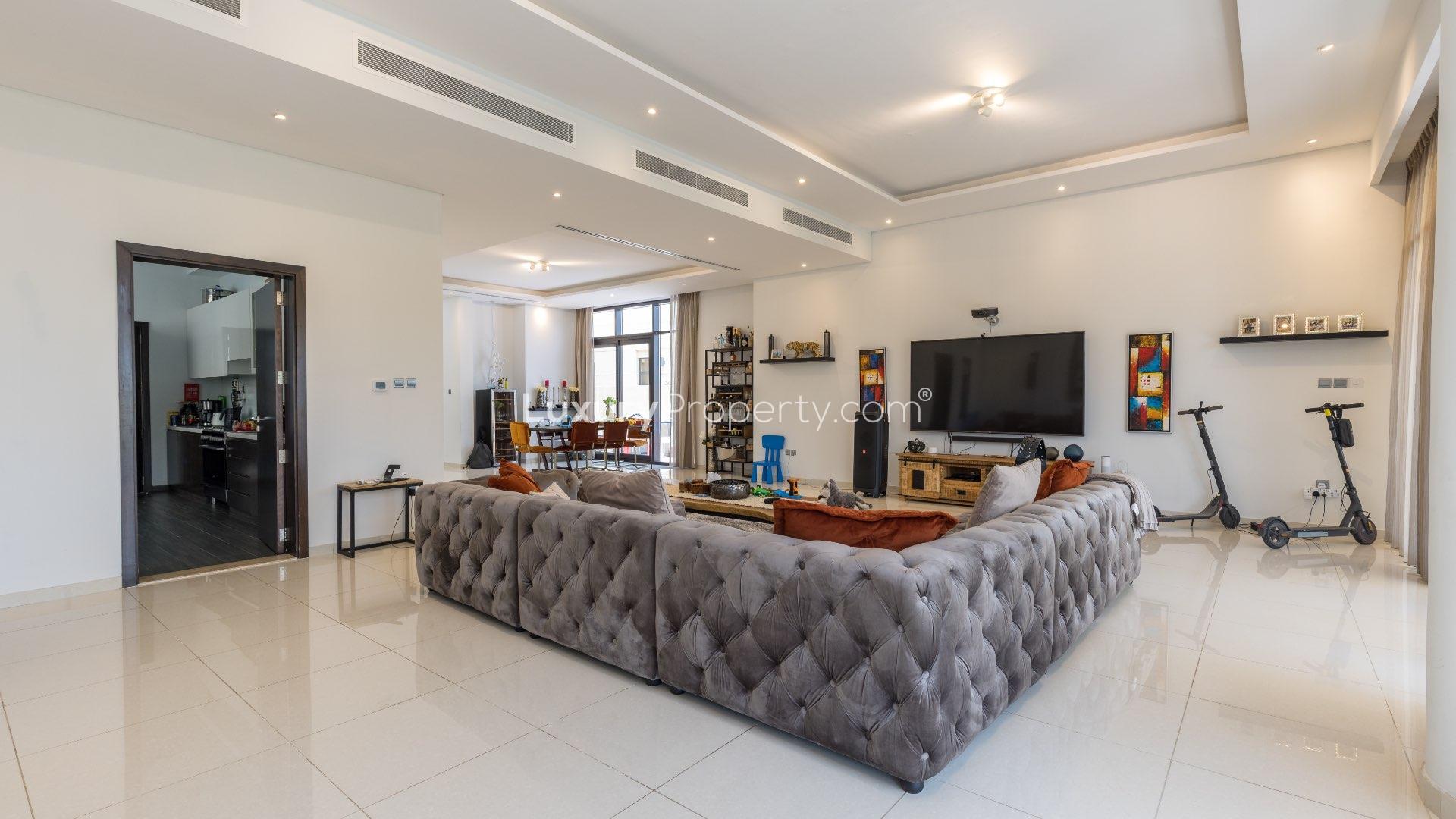 Spacious living room in 5-bedroom villa, Damac Hills, Whitefield, modern furnishings, open layout
