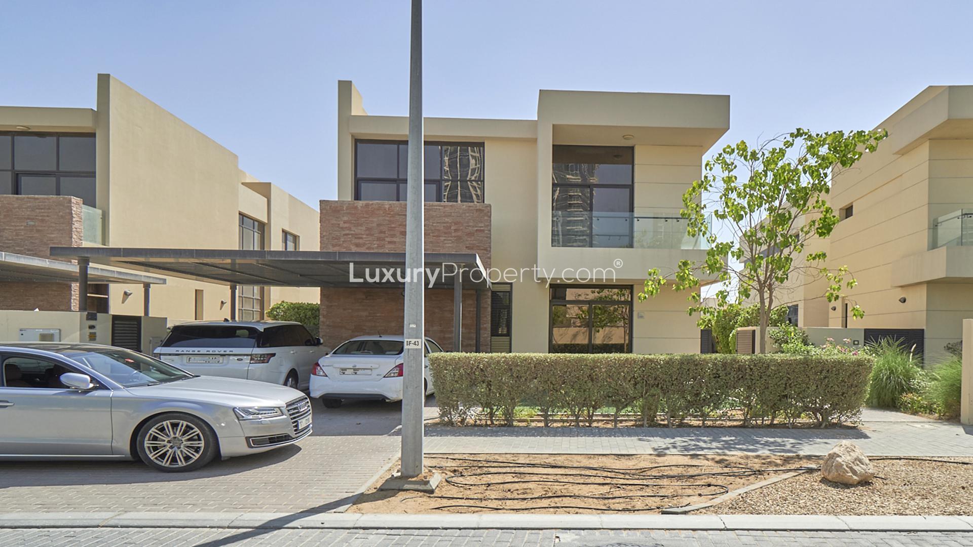 Spacious living room with large windows in Damac Hills villa for rent, Whitefield community