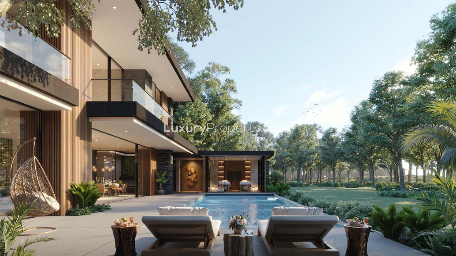 Lovely 5-bedroom villa exterior in Alaya, Tilal Al Ghaf, surrounded by lush greenery