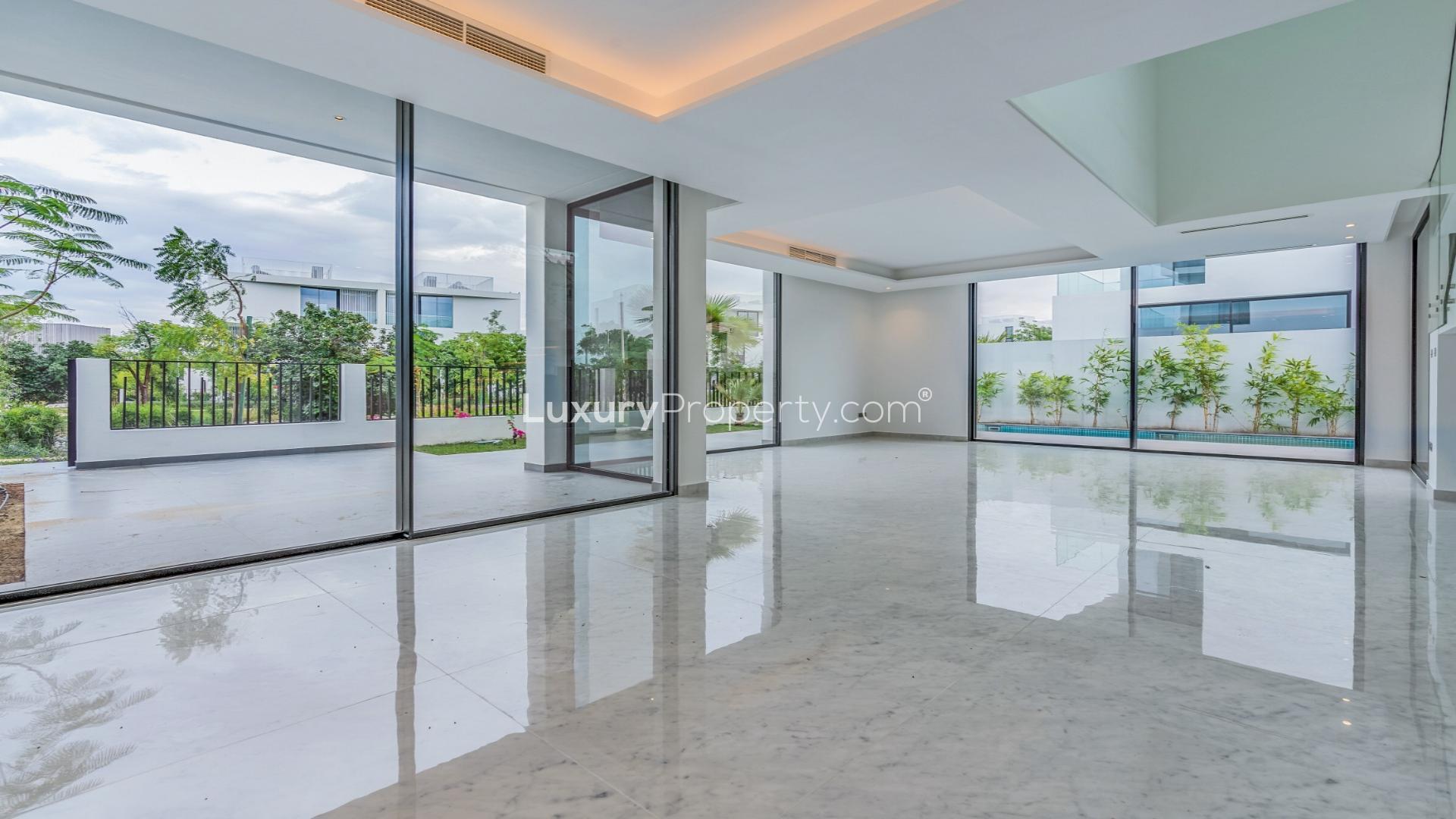 Contemporary 5-bedroom villa exterior in Al Barari, Chorisia 2 Villas, with garden view