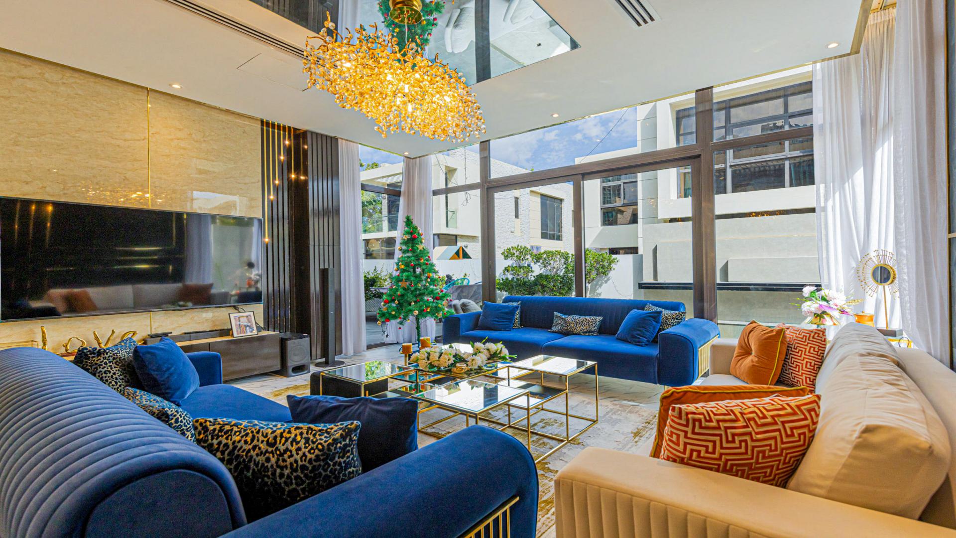 Luxurious living room in 5-bedroom villa at Damac Hills, Brookfield, with elegant decor