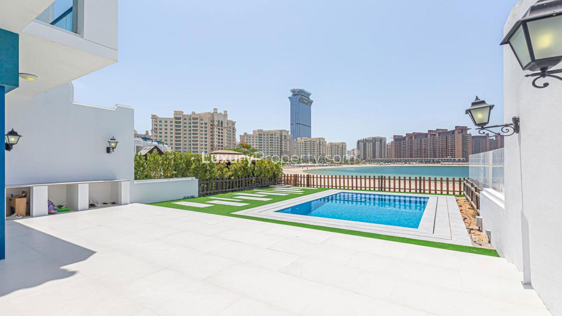 Bright living room with ocean view in Palma Residences, Palm Jumeirah beachfront villa