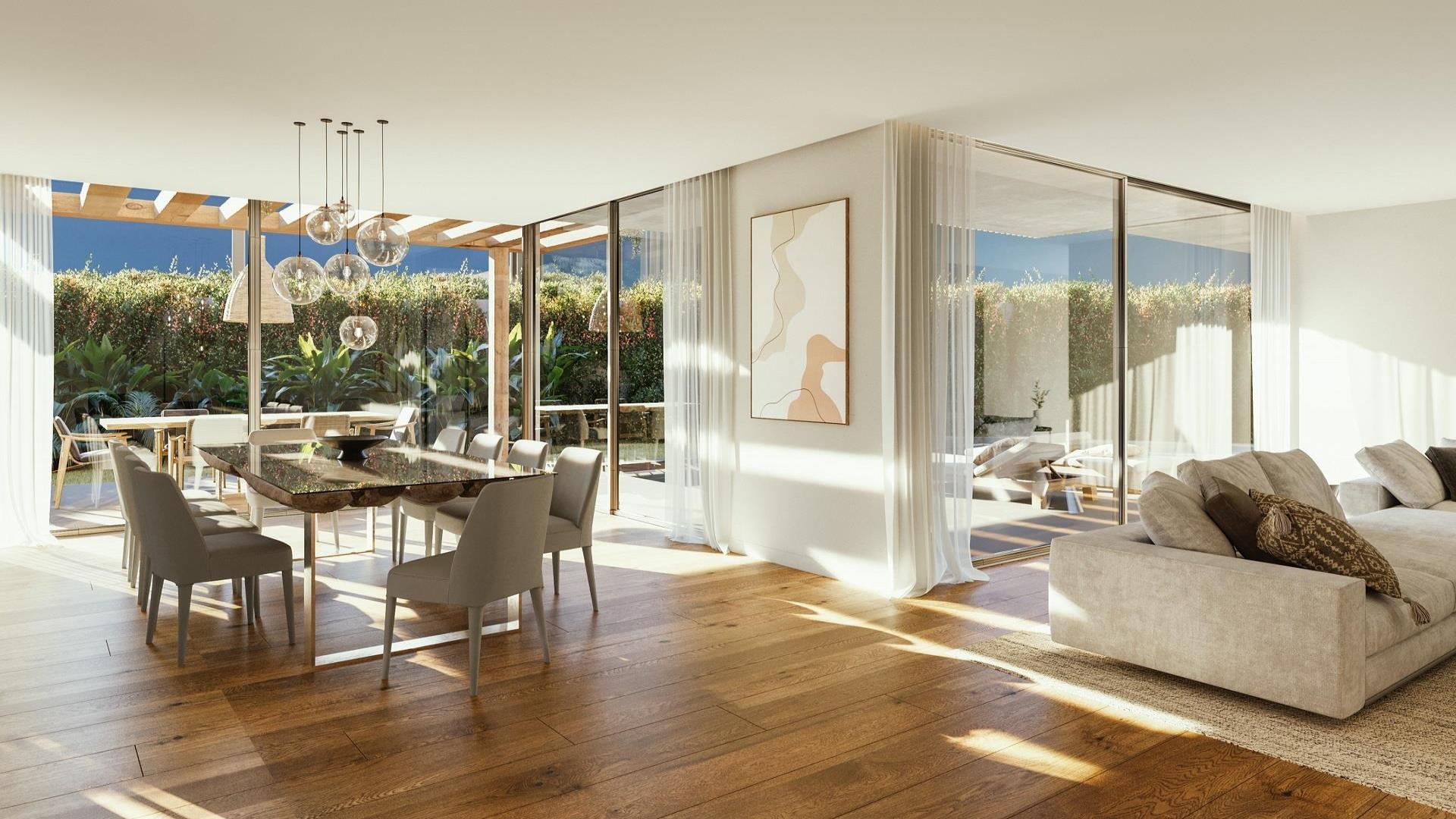 Modern living room with fireplace and garden view in Cascais villa for sale