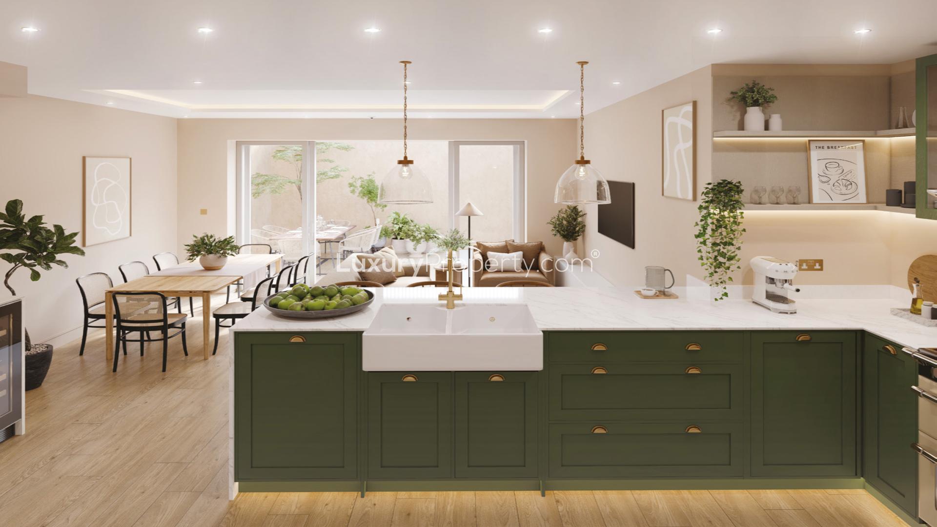 Spacious brick villa exterior in Wandsworth Common, Southwest London, with driveway and garden