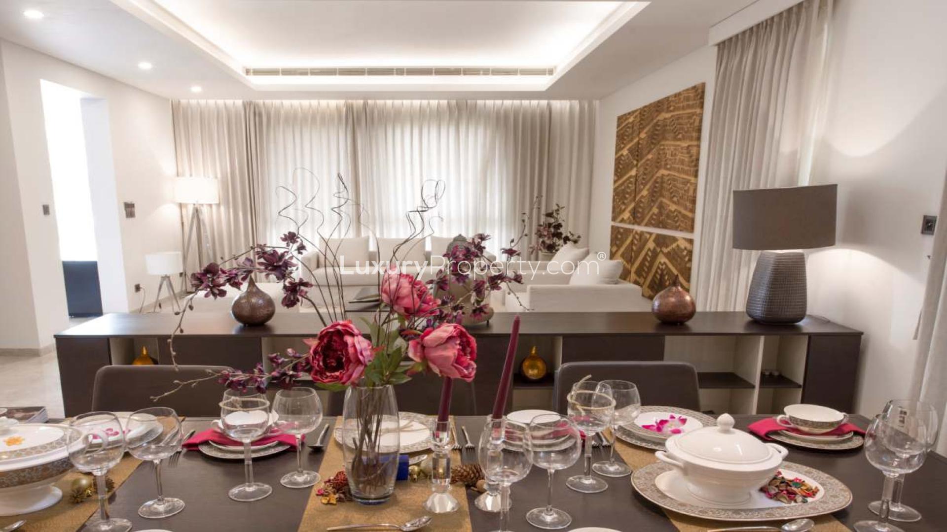 Elegant dining area in 5-bedroom villa, Sobha Phase 1, Gurgaon, featuring modern decor