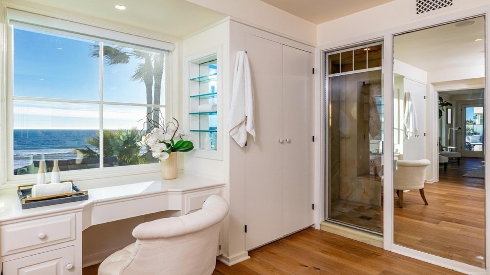 N/A,Bright villa bathroom with ocean view in Malibu Estate, featuring elegant white decor