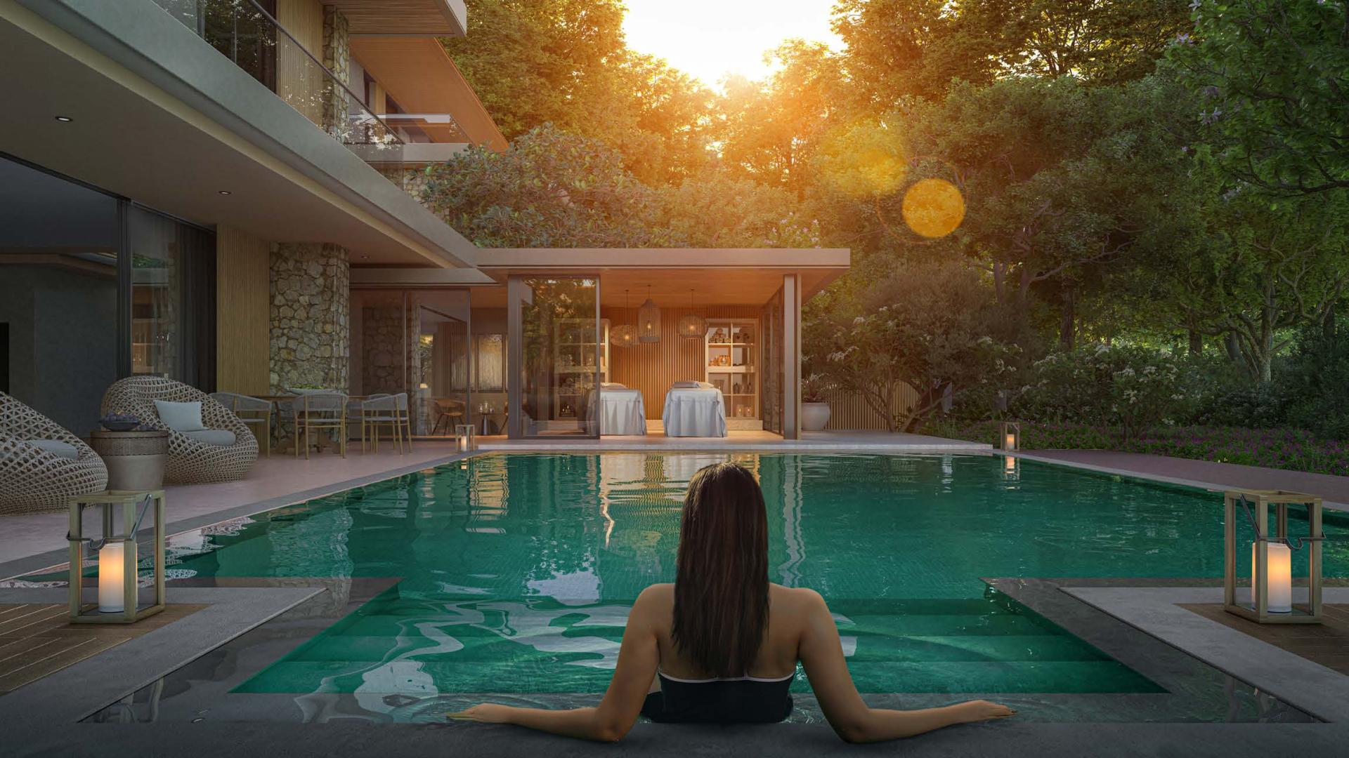 Luxurious living room in Alaya Beach Villa with pool view, Tilal Al Ghaf