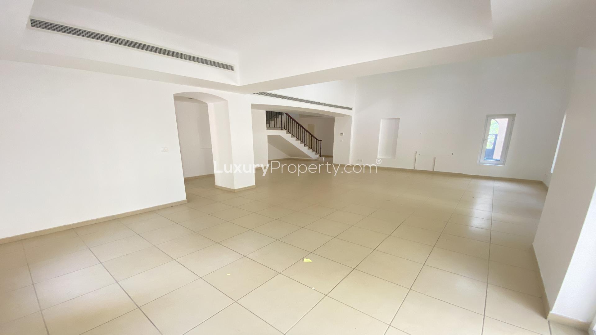 Spacious villa living room with high ceiling in Arabian Ranches, Al Mahra community