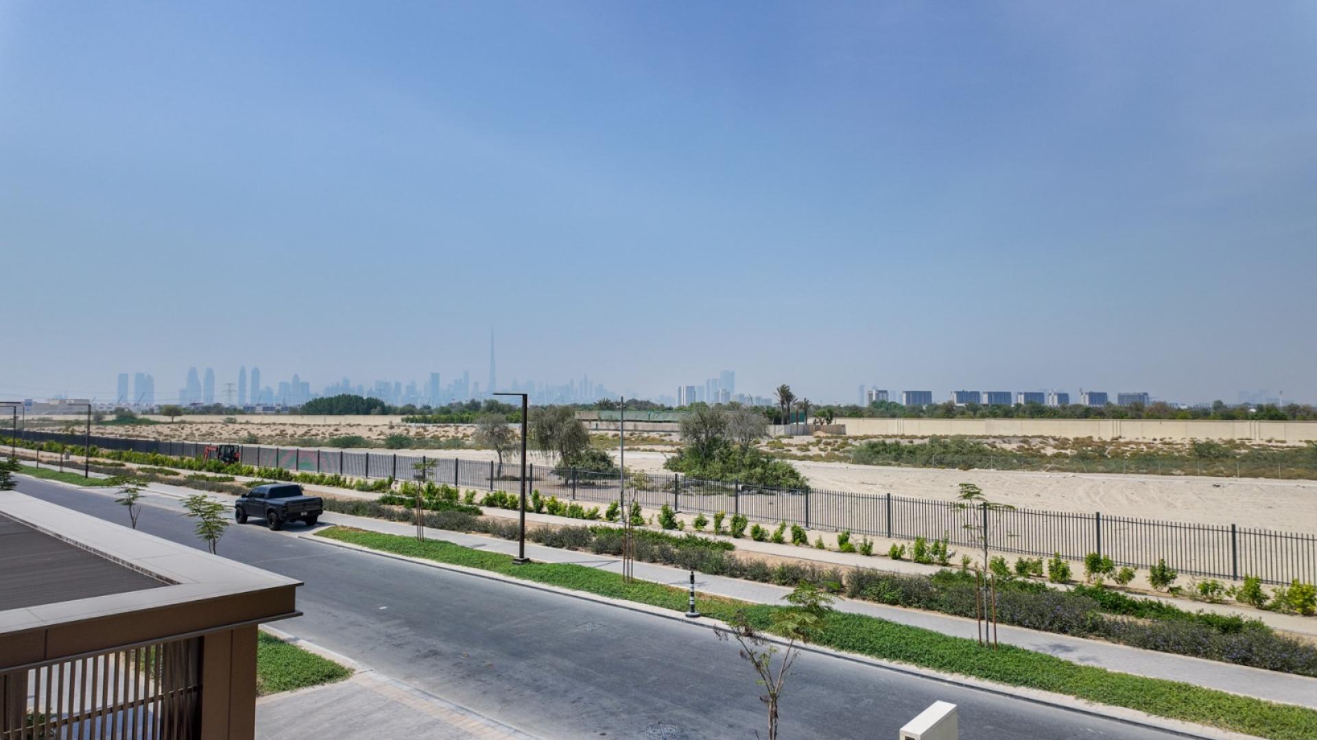 Bright open-plan kitchen and living area in Dubai Hills Estate villa for sale