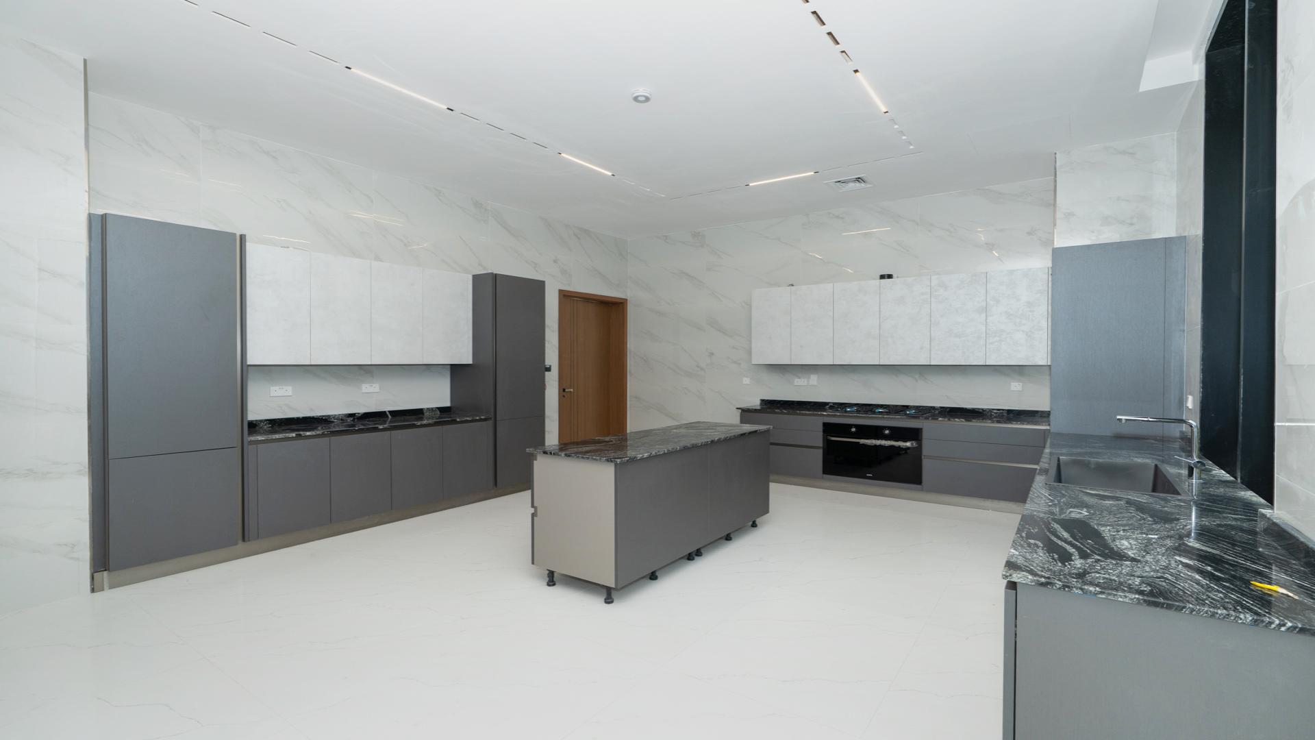 Luxurious Al Wasl villa interior with marble floors and downtown skyline views