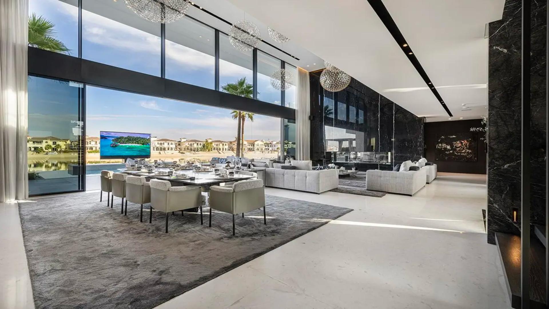 Luxurious living area in Palm Jumeirah villa with sea views and elegant decor