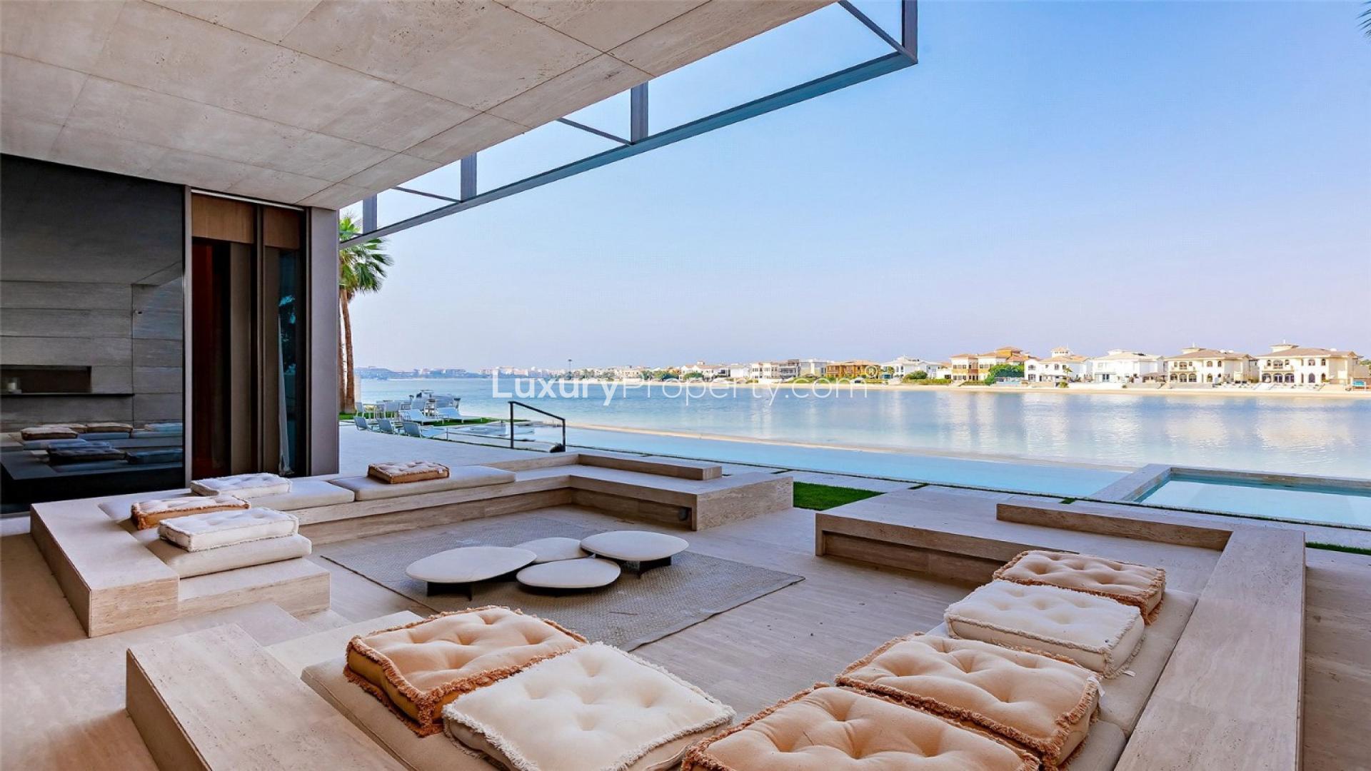 Luxurious open-plan living area with waterfront views, Palm Jumeirah Signature Villa for sale