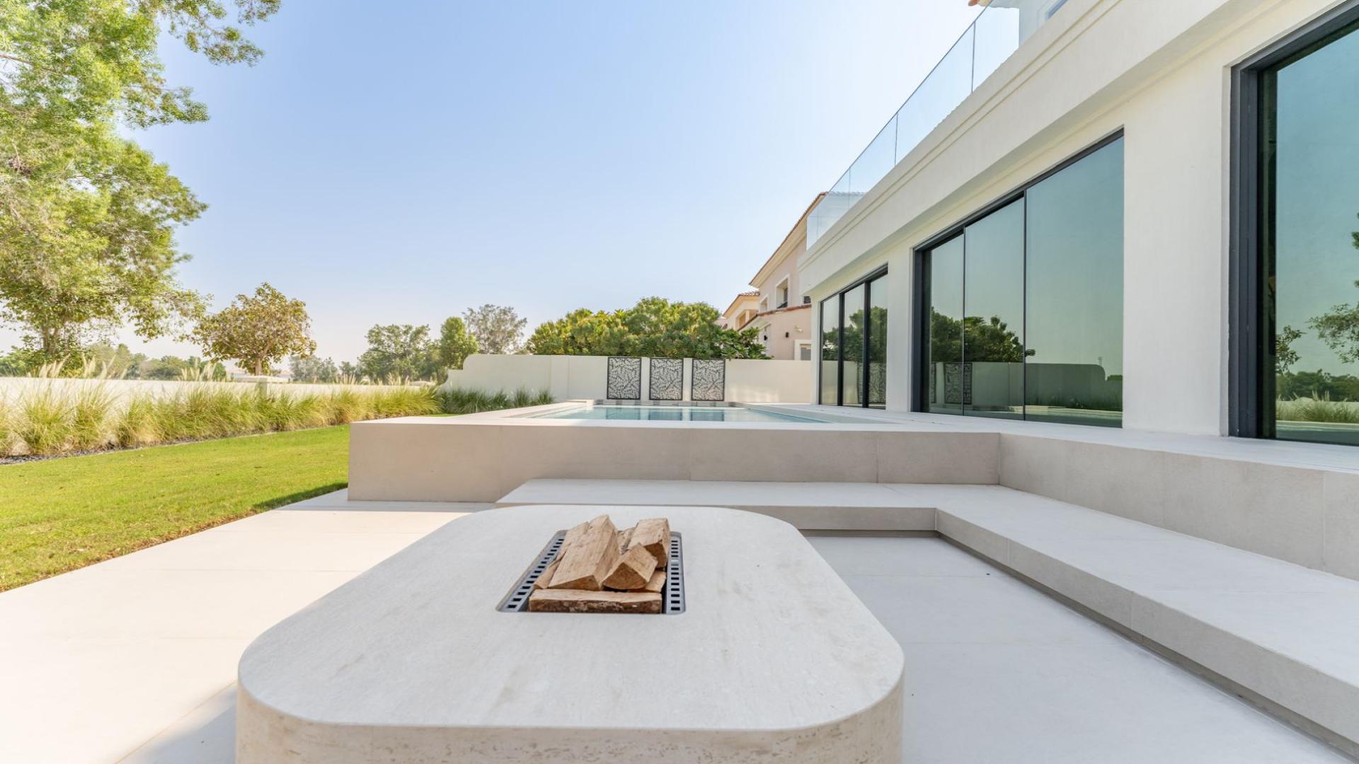 Luxurious living room in renovated villa, Wildflower, Jumeirah Golf Estates, with pool view