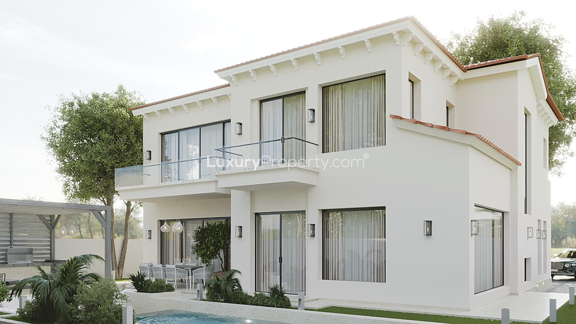 Modern living and dining area in Jumeirah Golf Estates villa, Earth community