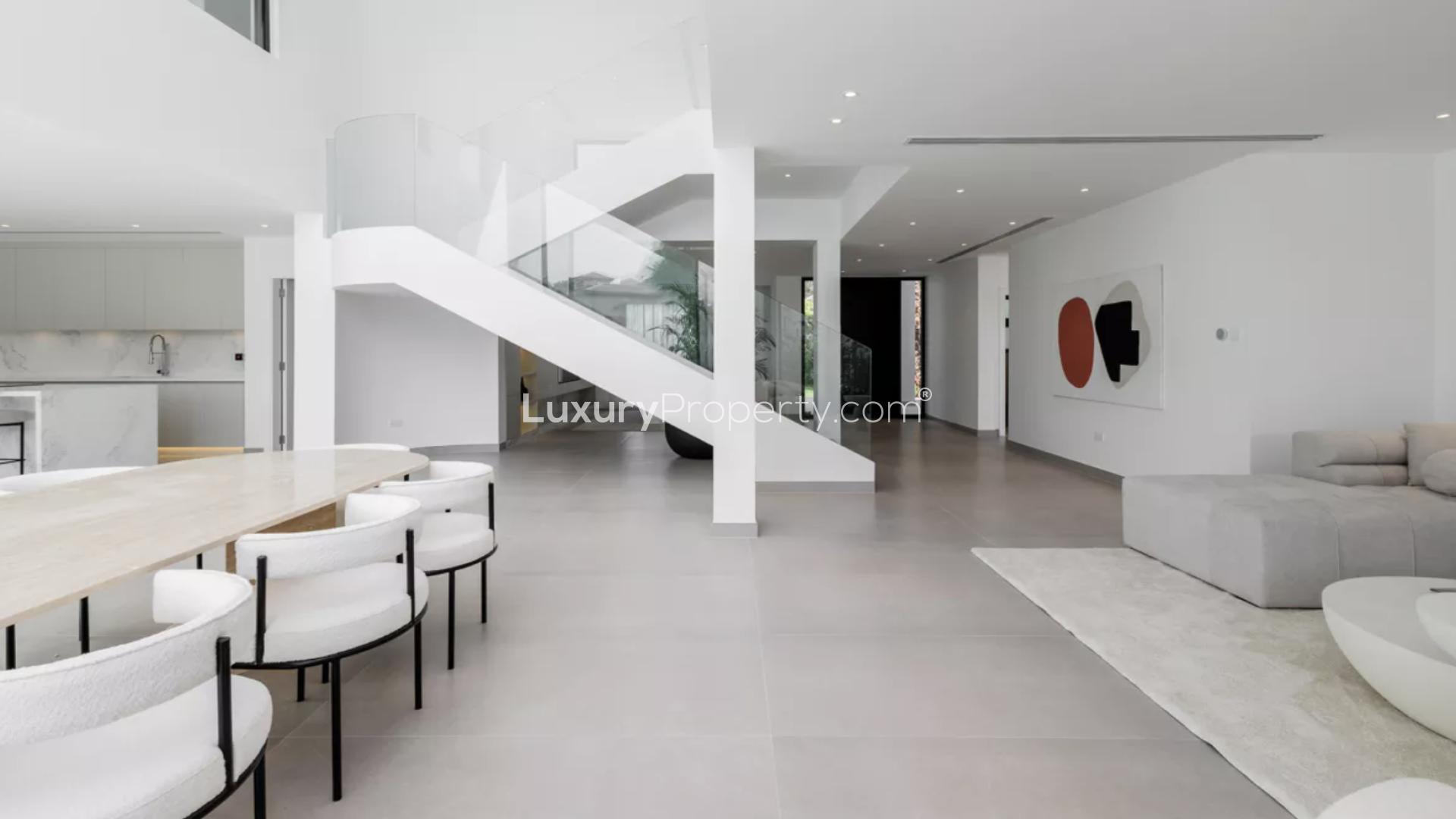 Modern kitchen in luxury Jumeirah Islands villa, featuring sleek cabinetry and high-end appliances
