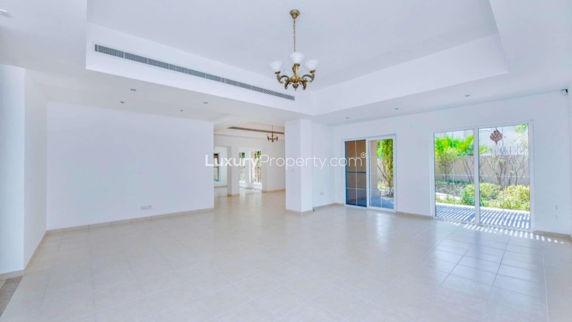 "Spacious Portuguese style villa with pool in Alvorada, Arabian Ranches, for sale.",Spacious living area in Portuguese style villa for sale, Alvorada, Arabian Ranches