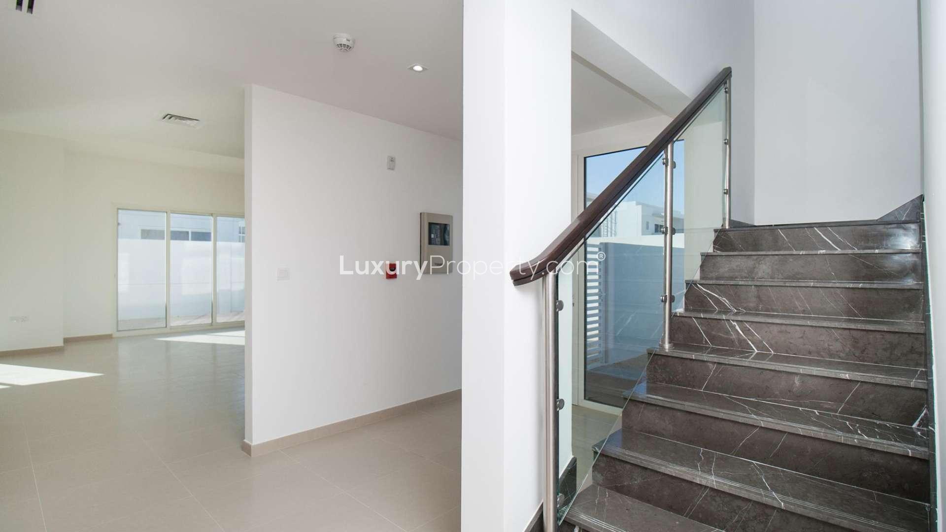 Beautiful 5-bedroom villa exterior in Arabella 3, Mudon, for sale. Spacious, modern design