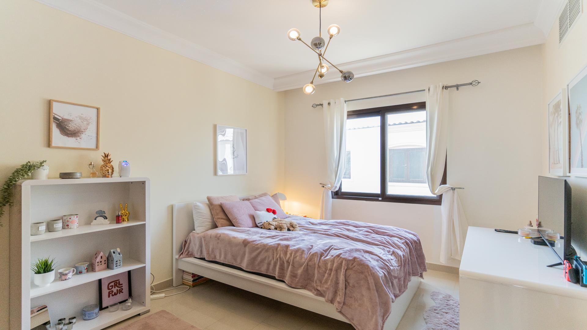 Children's bedroom in 5-bedroom villa for sale, Aseel, Arabian Ranches, with toys and decor