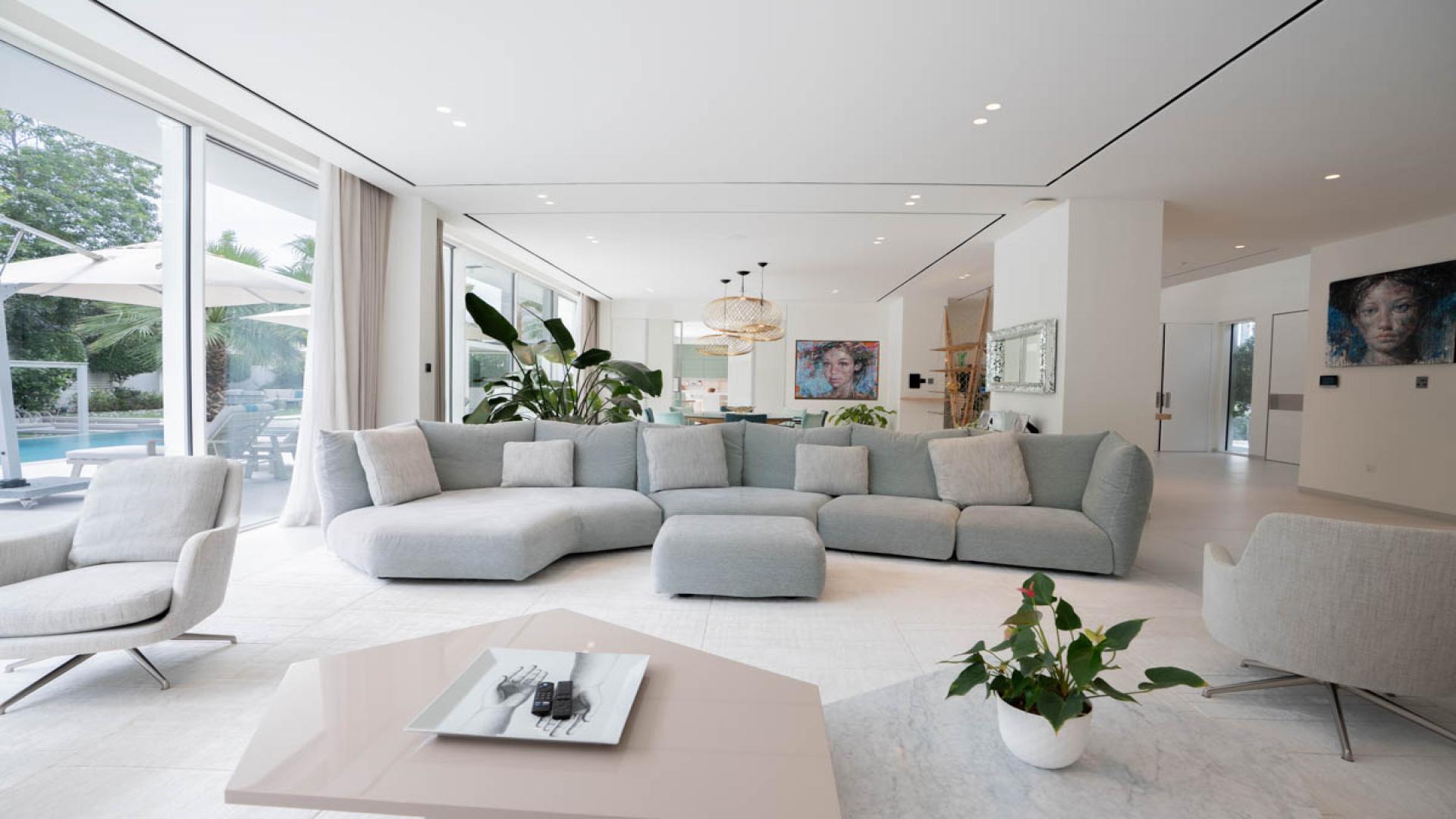 Luxury bedroom in 5-bedroom villa at The Nest, Al Barari, featuring modern decor