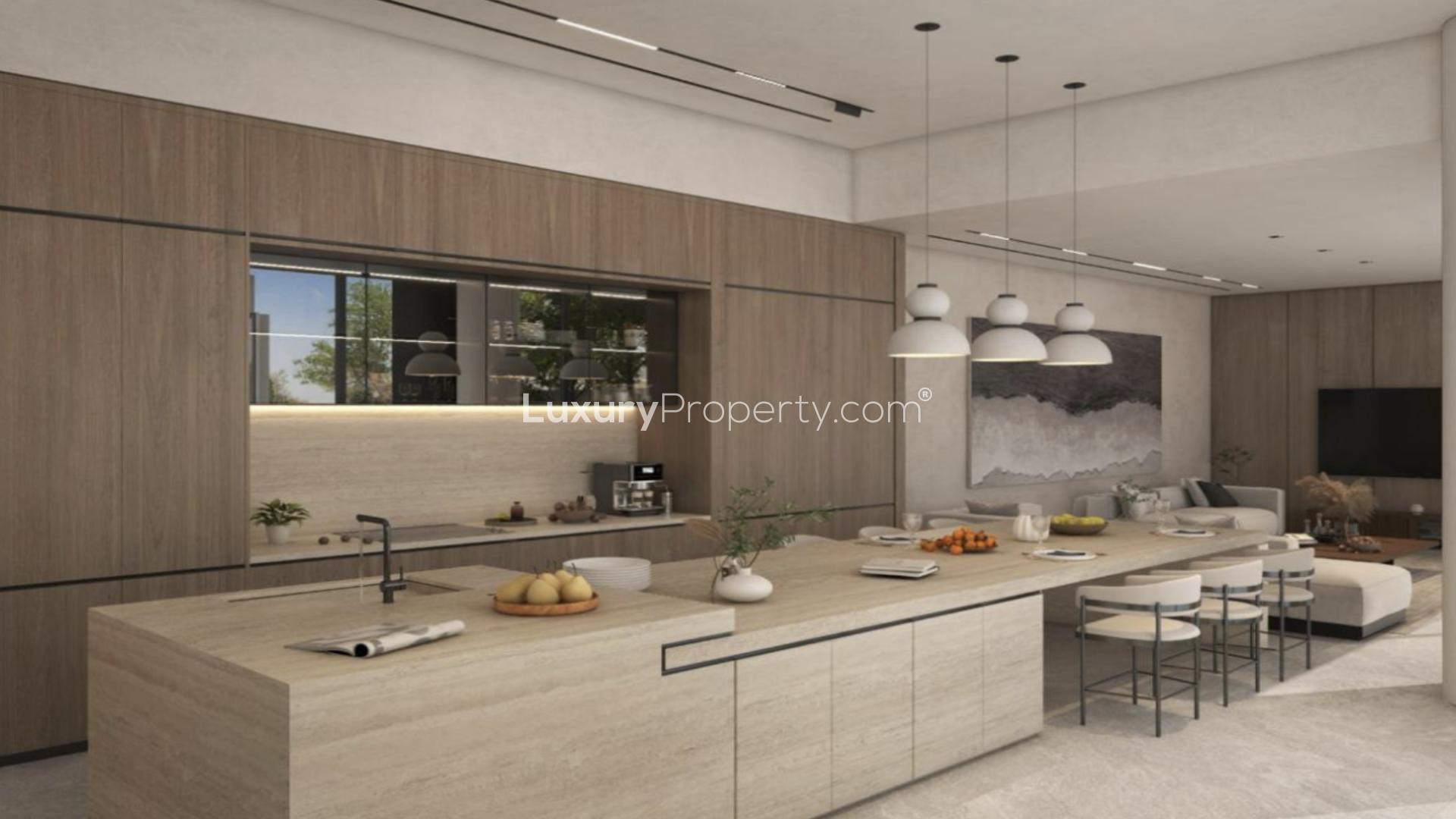 Elegant staircase and dining area in luxury Pearl Jumeirah villa, natural light and decor