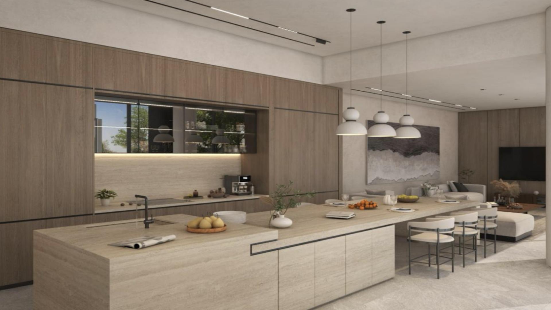 Elegant staircase and dining area in luxury Pearl Jumeirah villa, natural light and decor