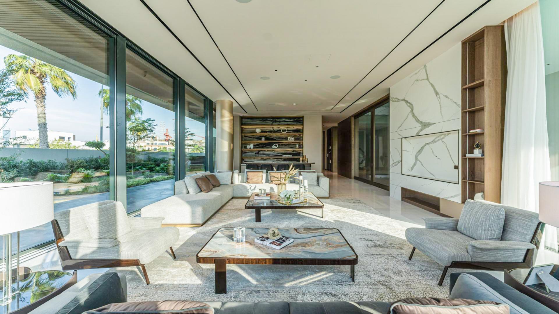 Luxurious living room in designer smart home villa, Pearl Jumeirah, with modern decor