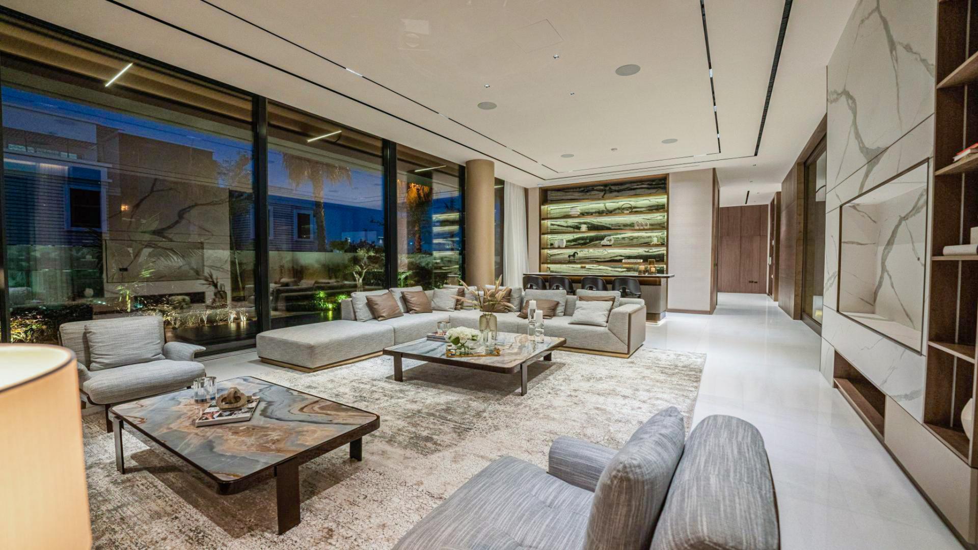 Luxurious living room in designer smart home villa, Pearl Jumeirah, with modern furnishings